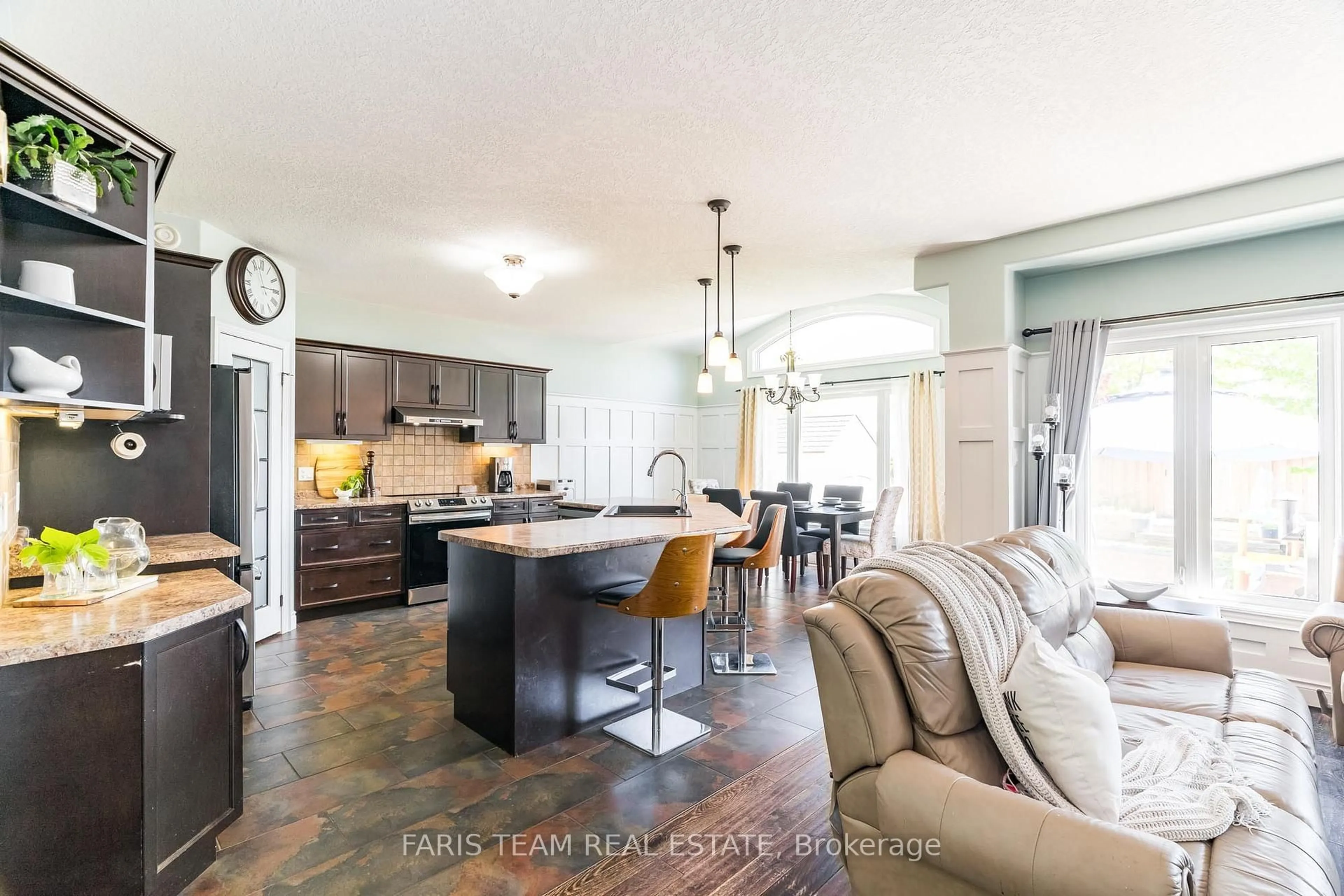 Open concept kitchen, ceramic/tile floor for 47 Quigley St, Essa Ontario L0M 1B6