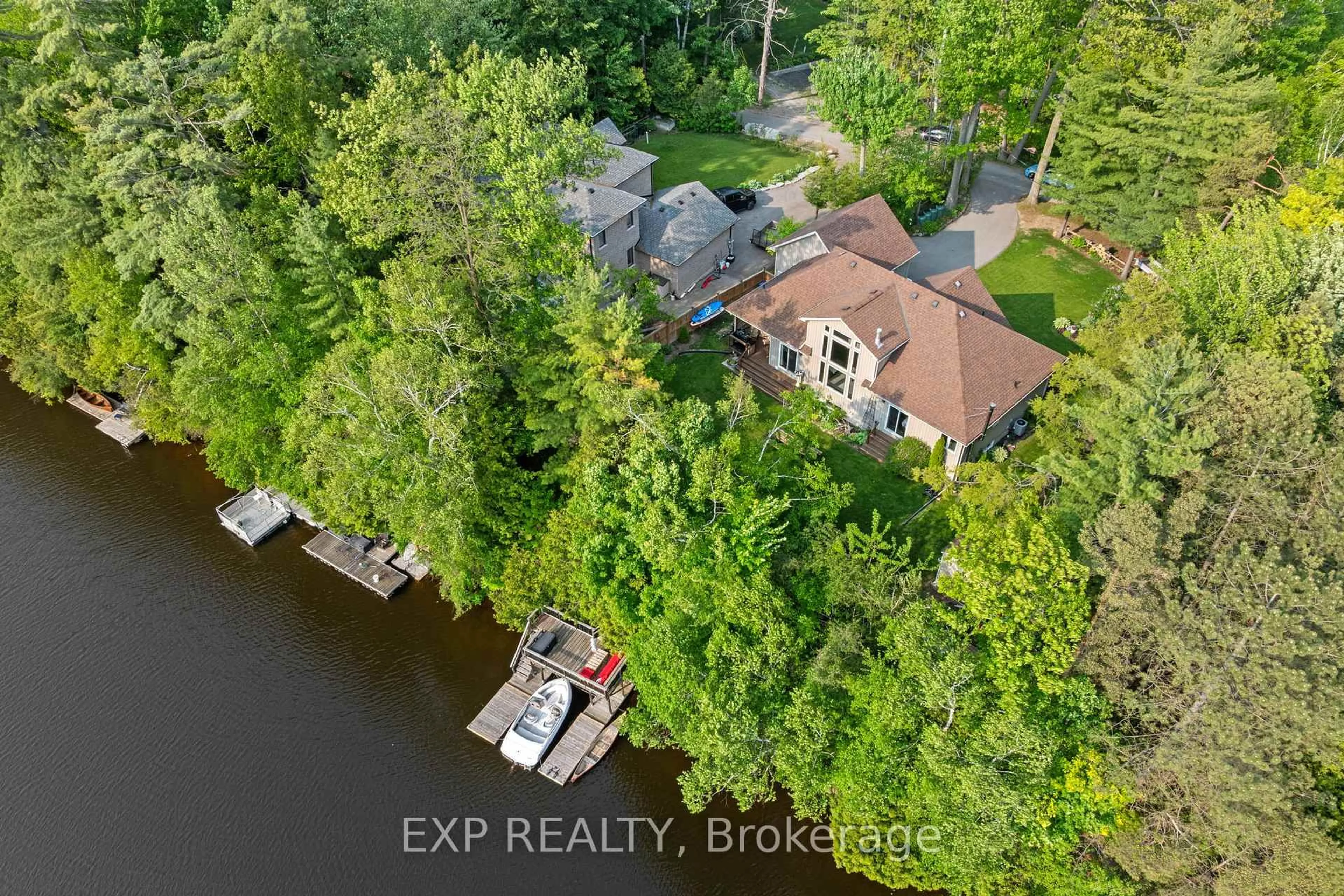 A pic from outside/outdoor area/front of a property/back of a property/a pic from drone, water/lake/river/ocean view for 2 Birch Knoll Rd, Georgina Ontario L0E 1R0
