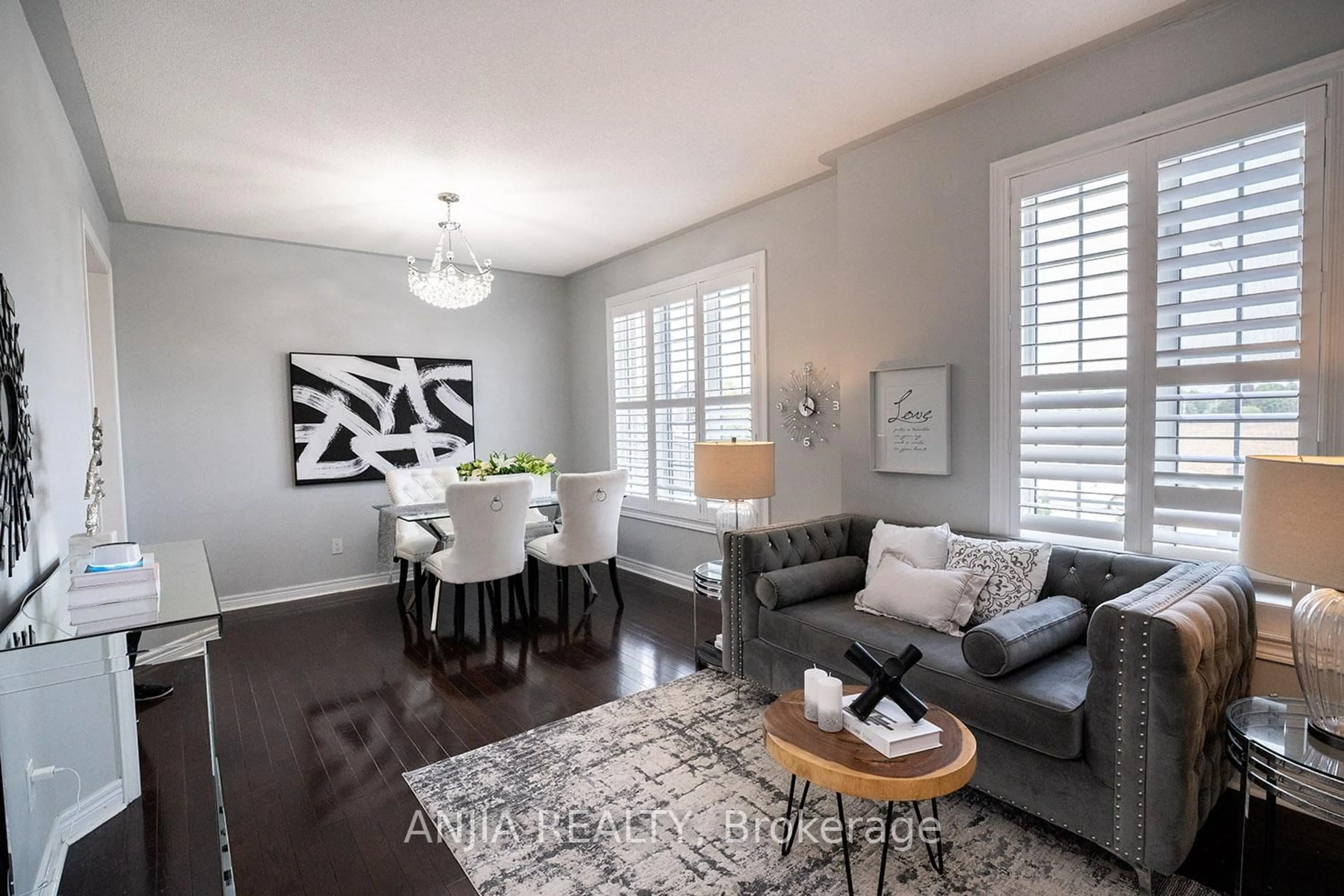 Living room with furniture, wood/laminate floor for 68 Lucida Crt, Whitchurch-Stouffville Ontario L4A 1S1