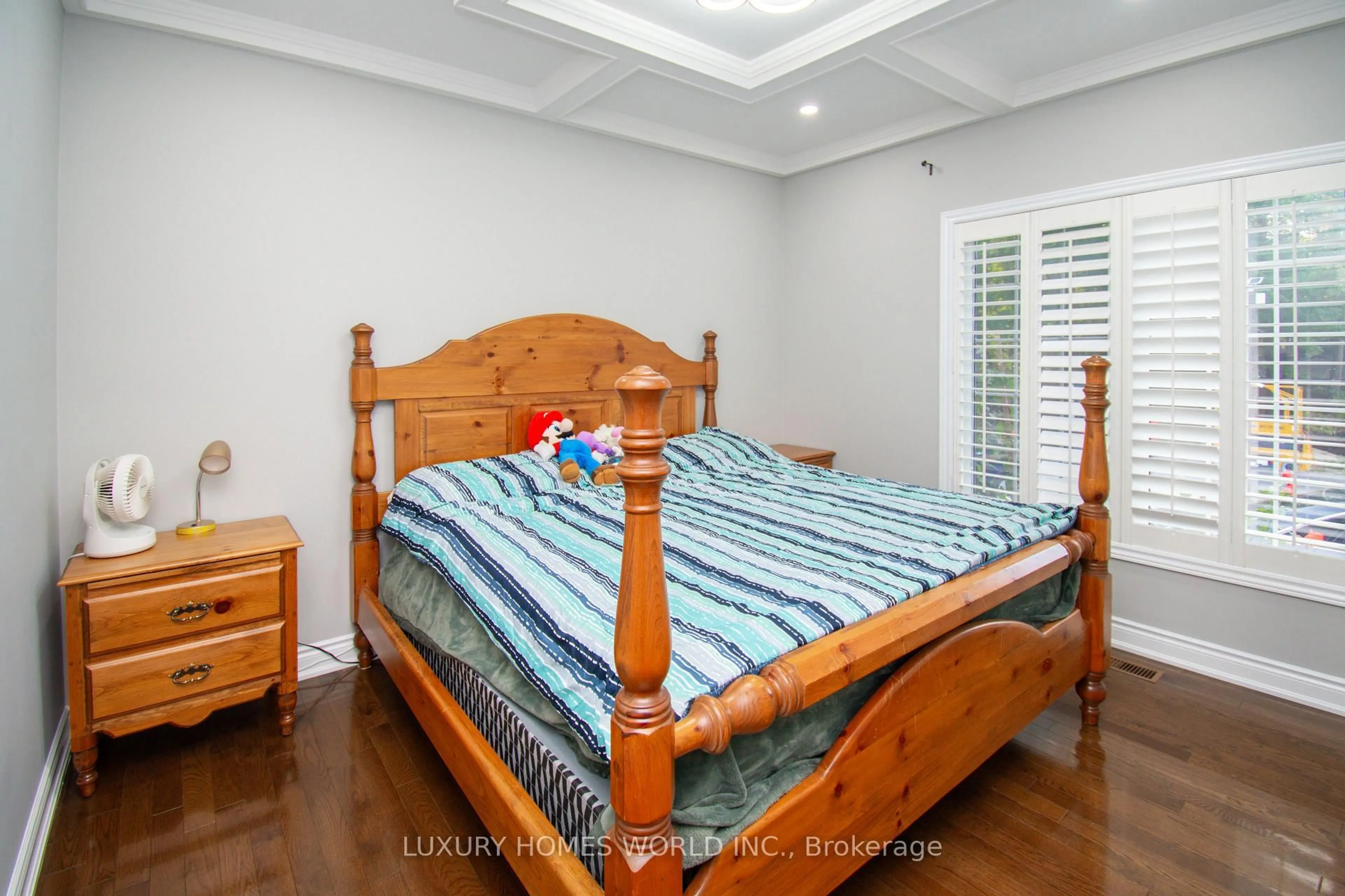 Bedroom with bed, wood/laminate floor for 3965 Algoma Ave, Innisfil Ontario L9S 2M1