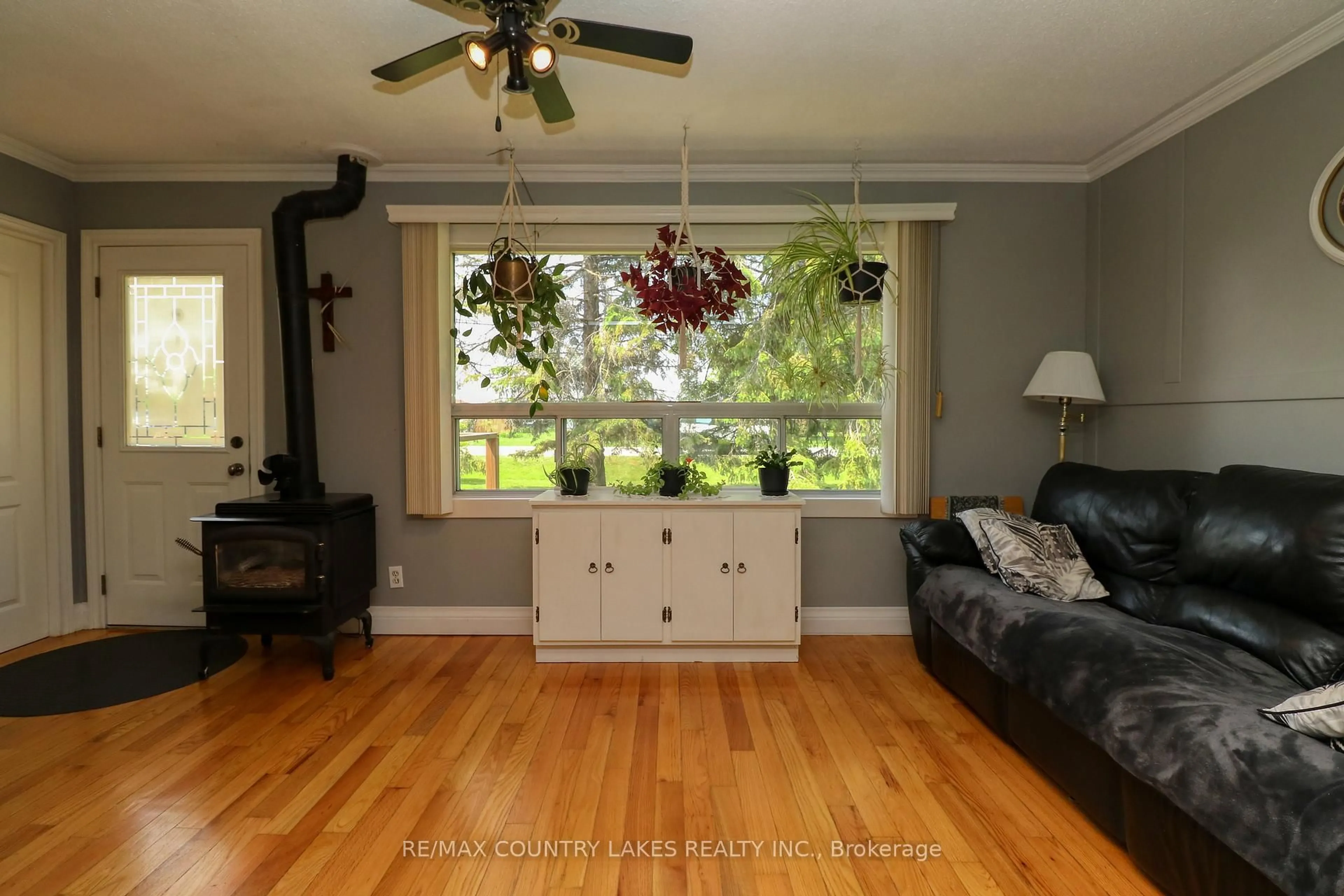 Living room with furniture, wood/laminate floor for 15 Nancy Ave, Brock Ontario L0K 1A0