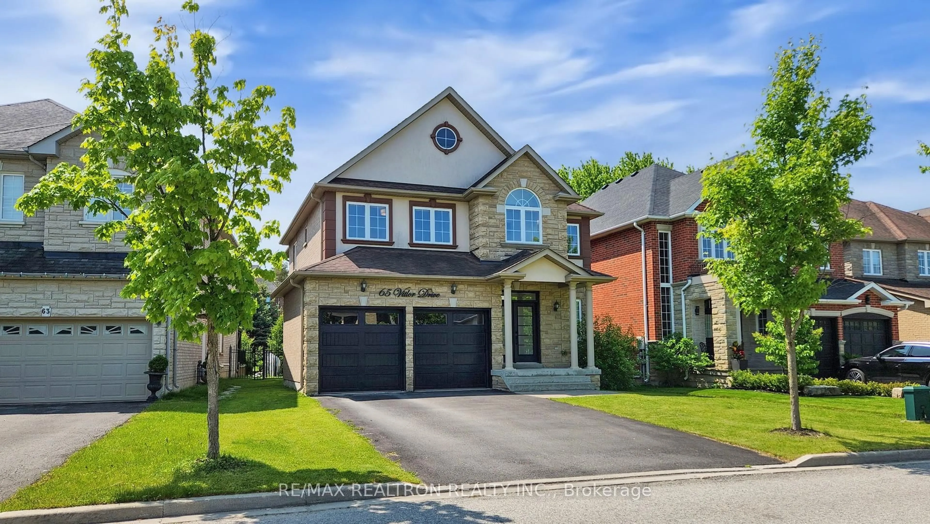 Home with brick exterior material, street for 65 Vitlor Dr, Richmond Hill Ontario L4E 0G3