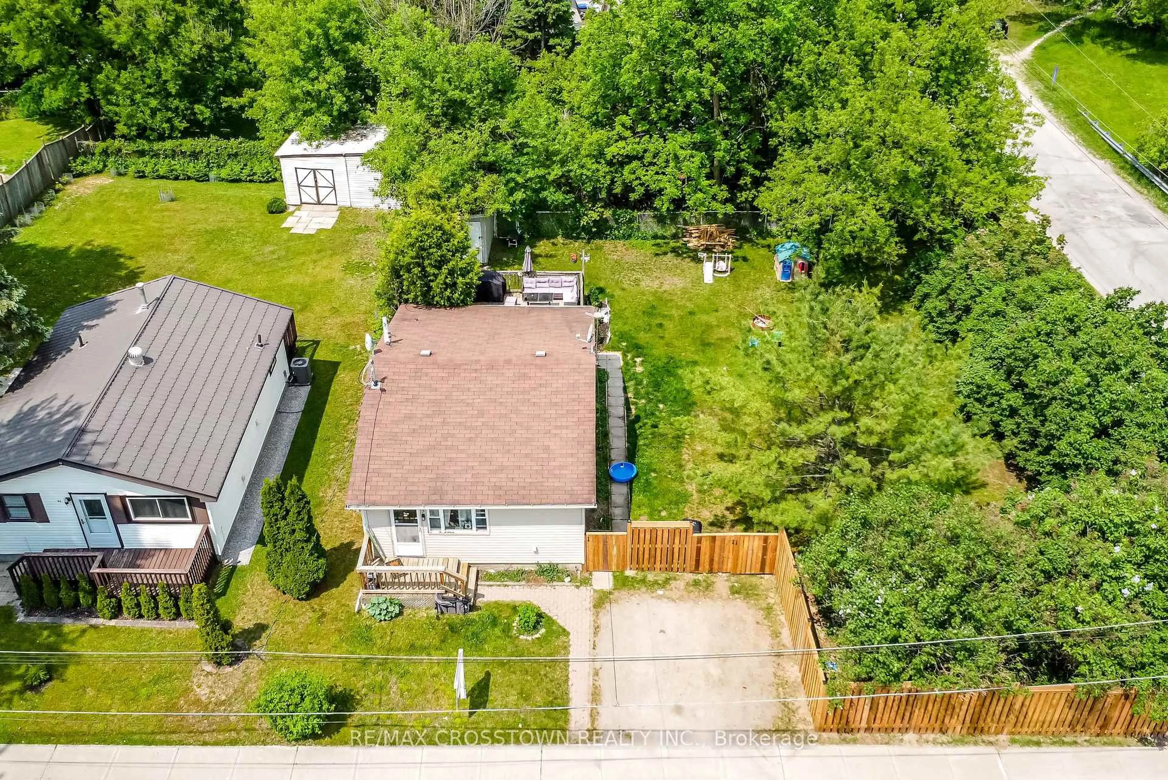 A pic from outside/outdoor area/front of a property/back of a property/a pic from drone, street for 97 Elm St, Essa Ontario L0W 1B0