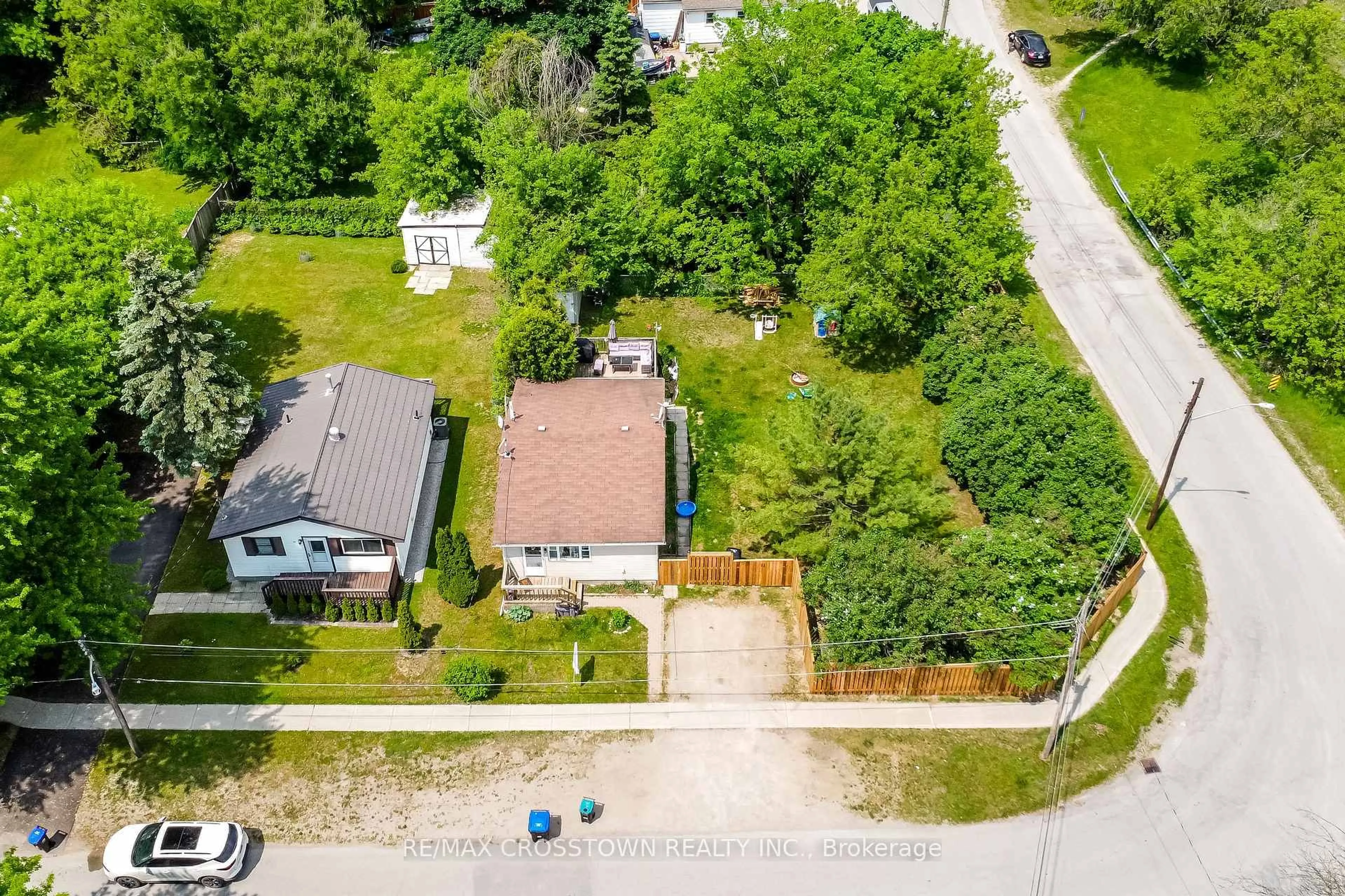 A pic from outside/outdoor area/front of a property/back of a property/a pic from drone, street for 97 Elm St, Essa Ontario L0W 1B0