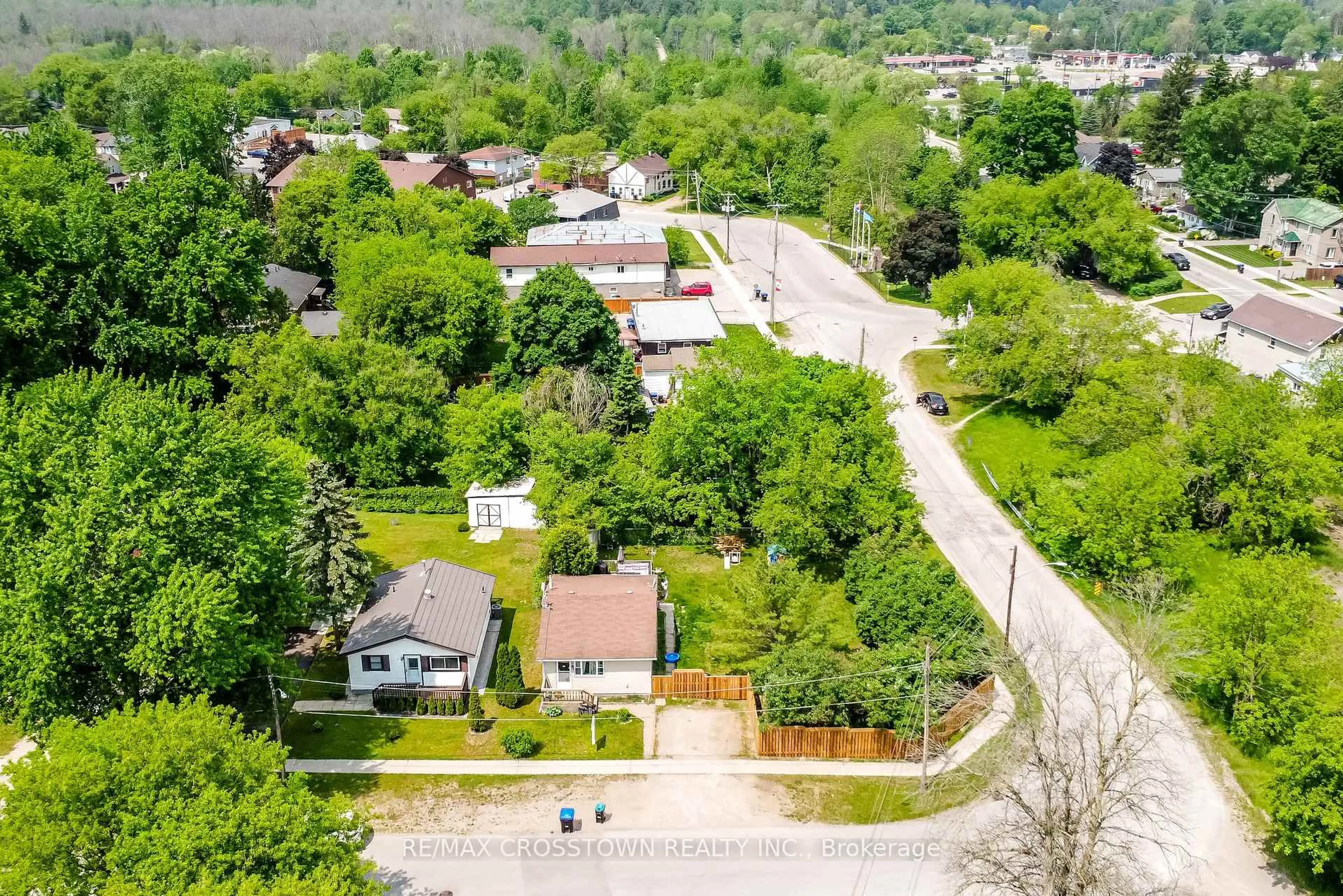 A pic from outside/outdoor area/front of a property/back of a property/a pic from drone, street for 97 Elm St, Essa Ontario L0W 1B0