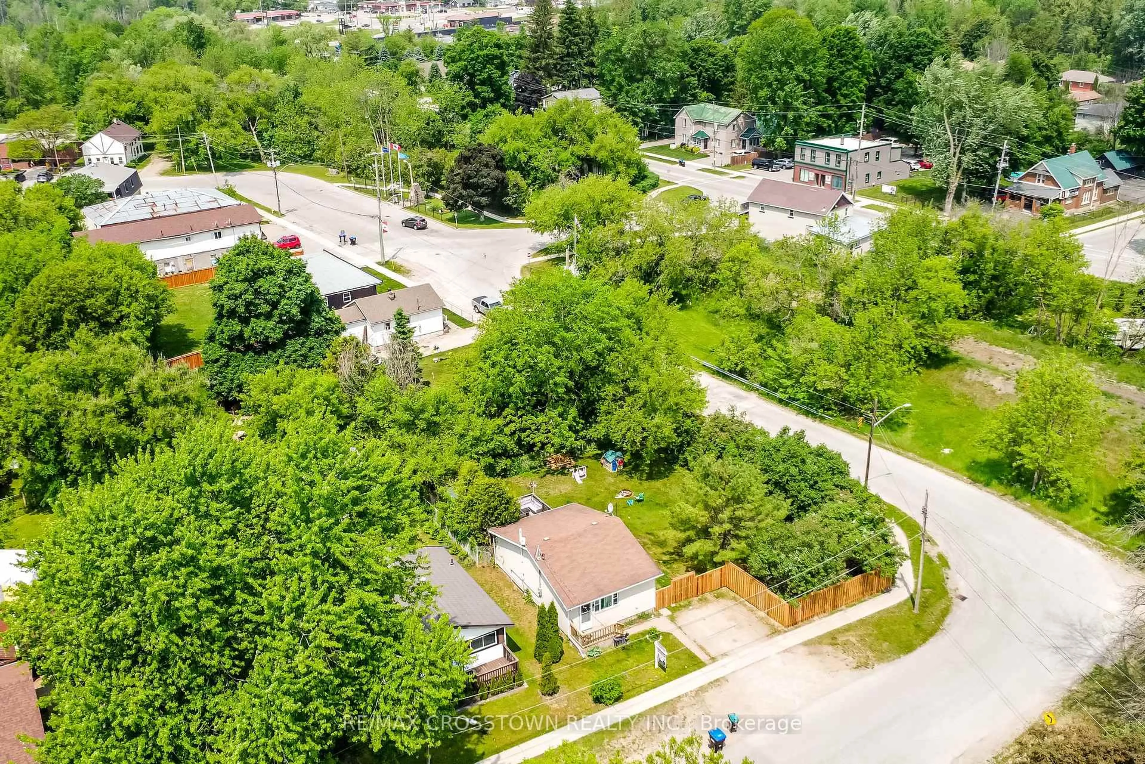 A pic from outside/outdoor area/front of a property/back of a property/a pic from drone, street for 97 Elm St, Essa Ontario L0W 1B0