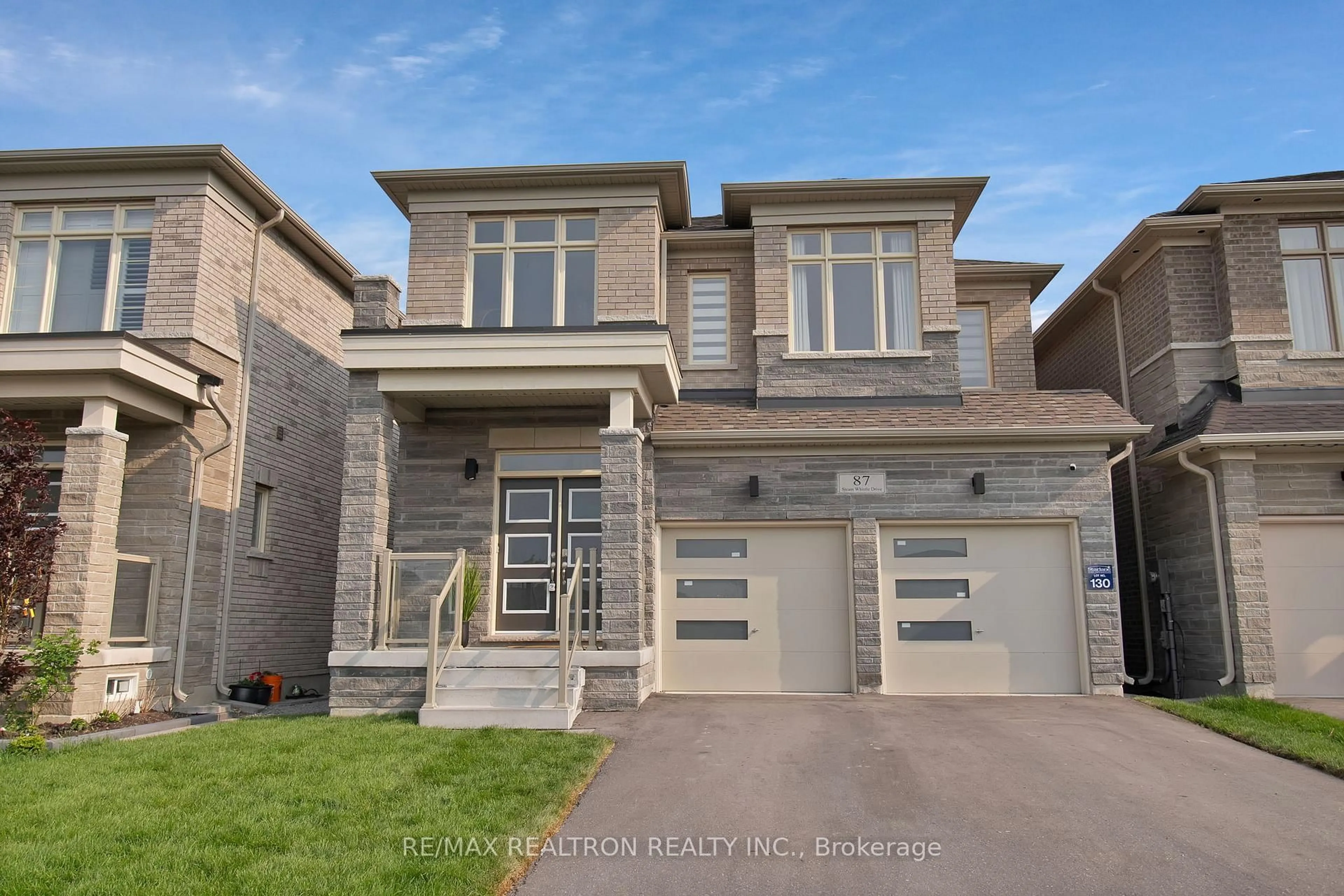 Home with brick exterior material, street for 87 Steam Whistle Dr, Whitchurch-Stouffville Ontario L4A 4X5