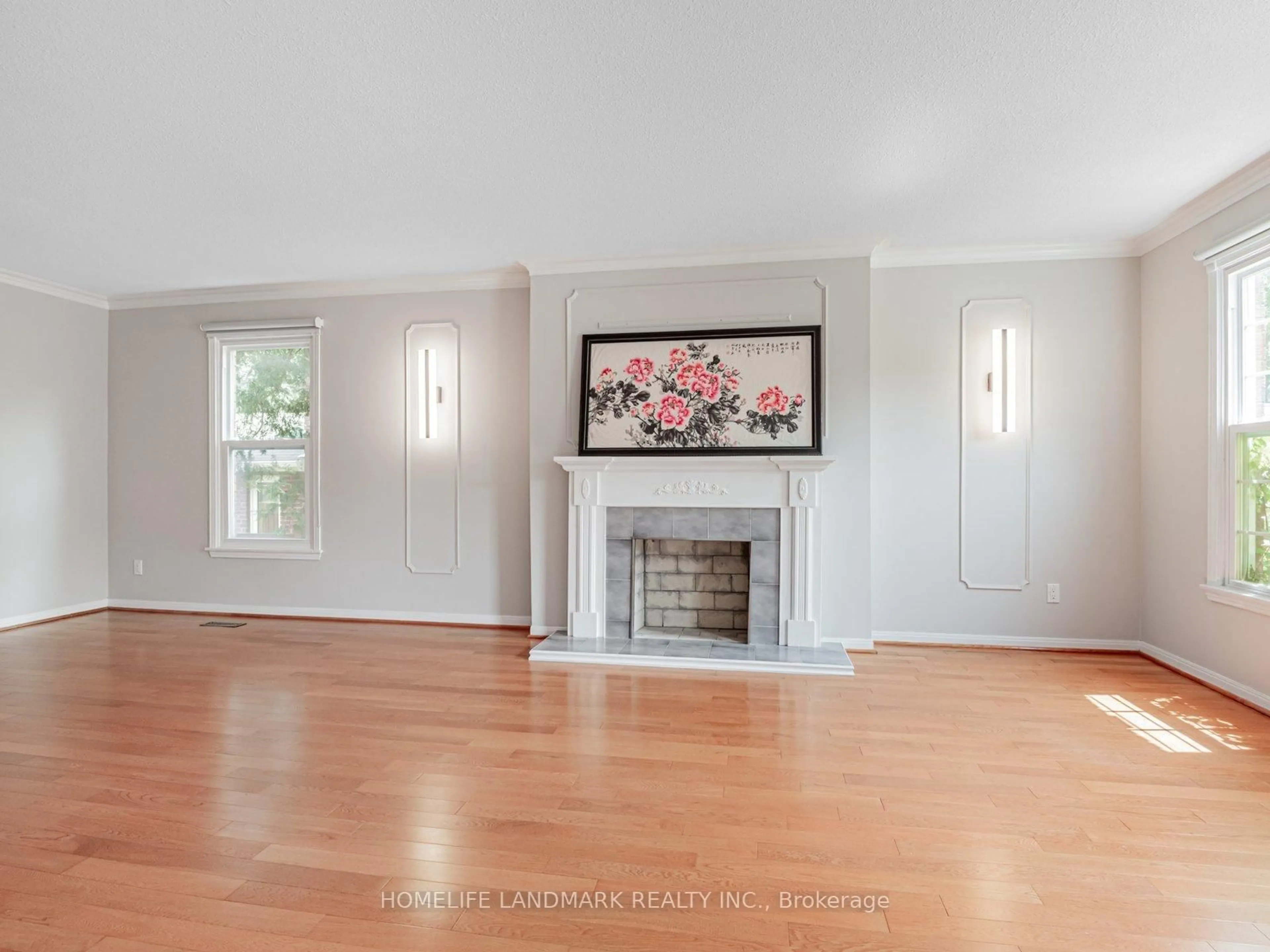 Living room with furniture, wood/laminate floor for 16 Briarwood Rd, Markham Ontario L3R 2X2