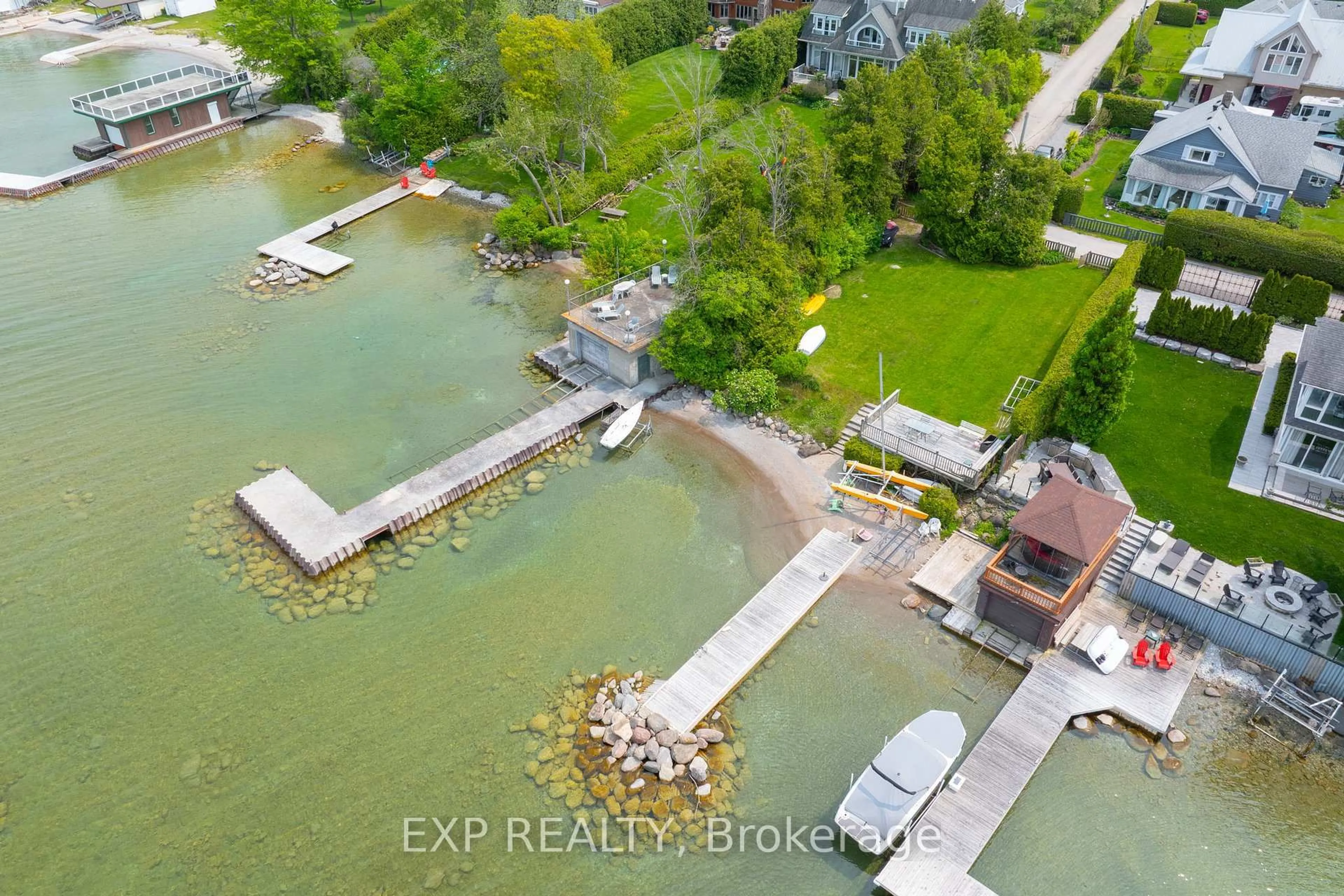 A pic from outside/outdoor area/front of a property/back of a property/a pic from drone, water/lake/river/ocean view for 55 Westwind Circ, Georgina Ontario L0L 1S0
