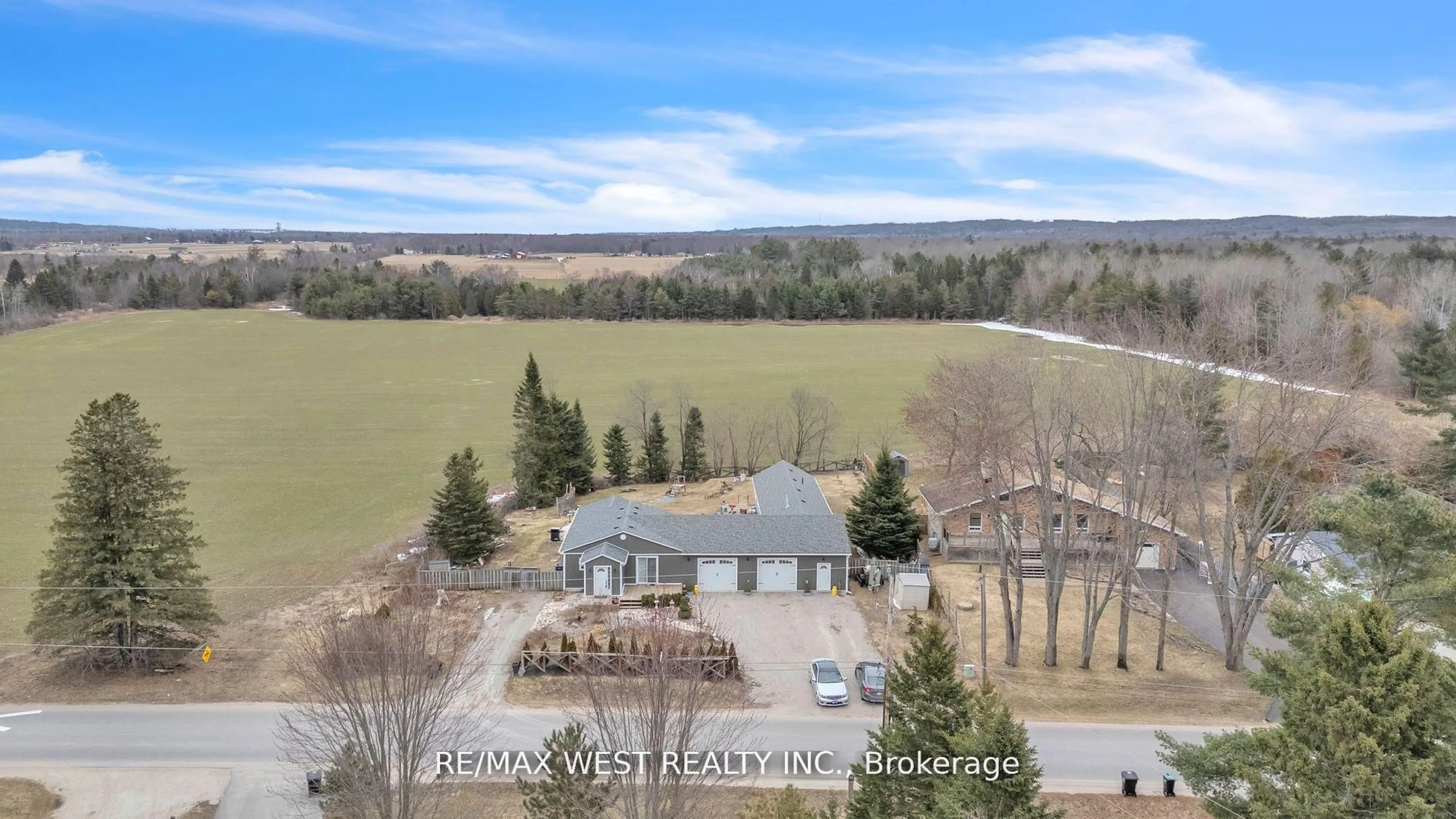 A pic from outside/outdoor area/front of a property/back of a property/a pic from drone, water/lake/river/ocean view for 8709 9th Line, Essa Ontario L0M 1T0