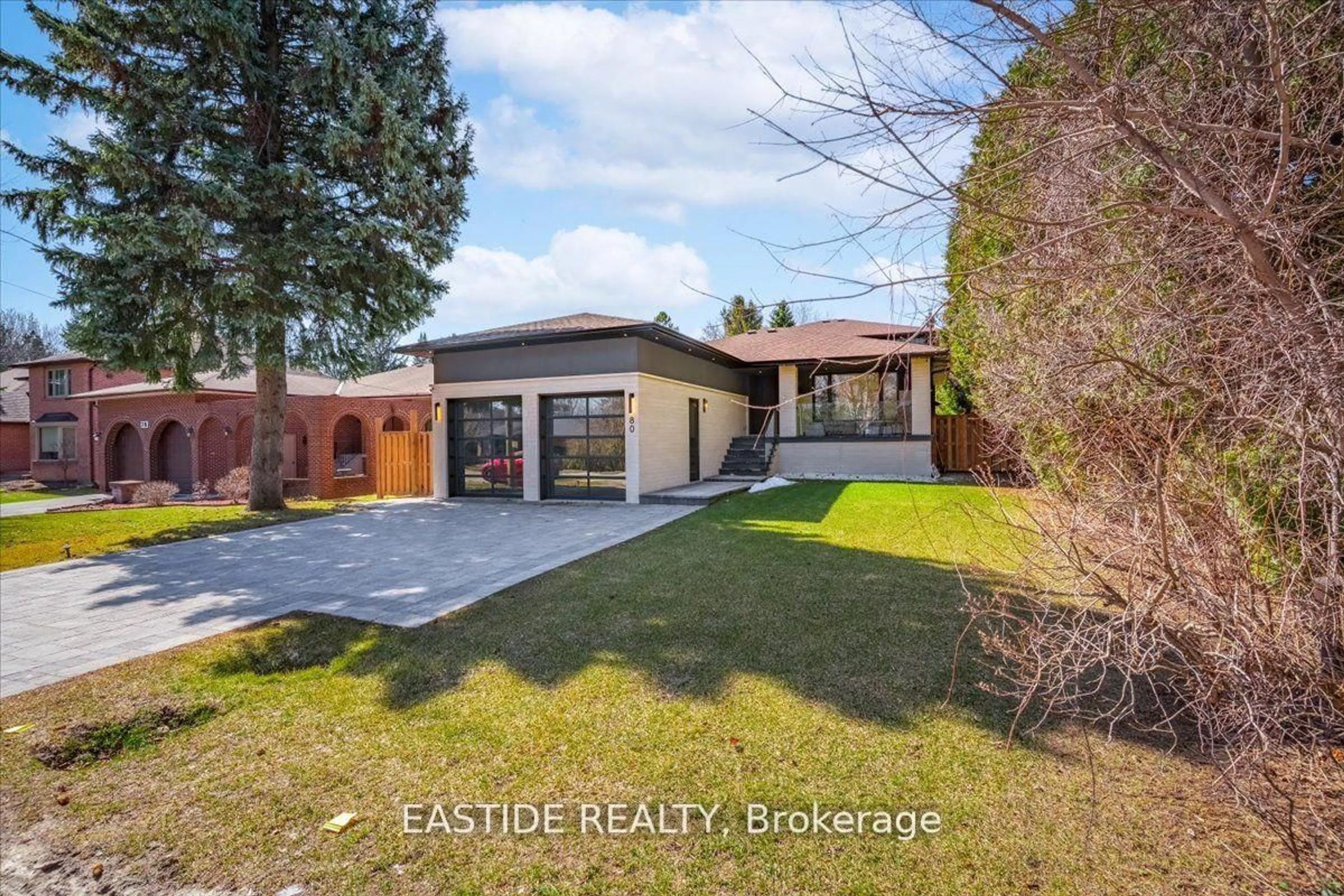 Home with brick exterior material, street for 80 Sprucewood Dr, Markham Ontario L3T 2R1