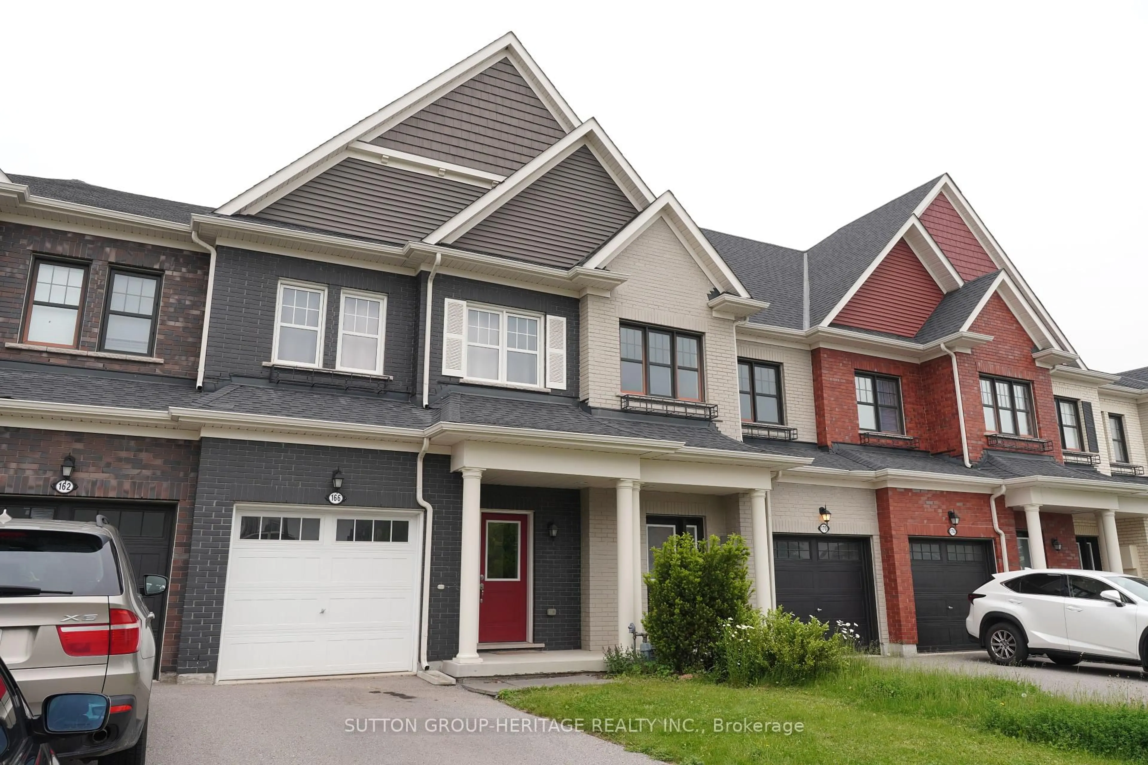 Home with brick exterior material, street for 166 Boadway Cres, Whitchurch-Stouffville Ontario L4A 1Y5