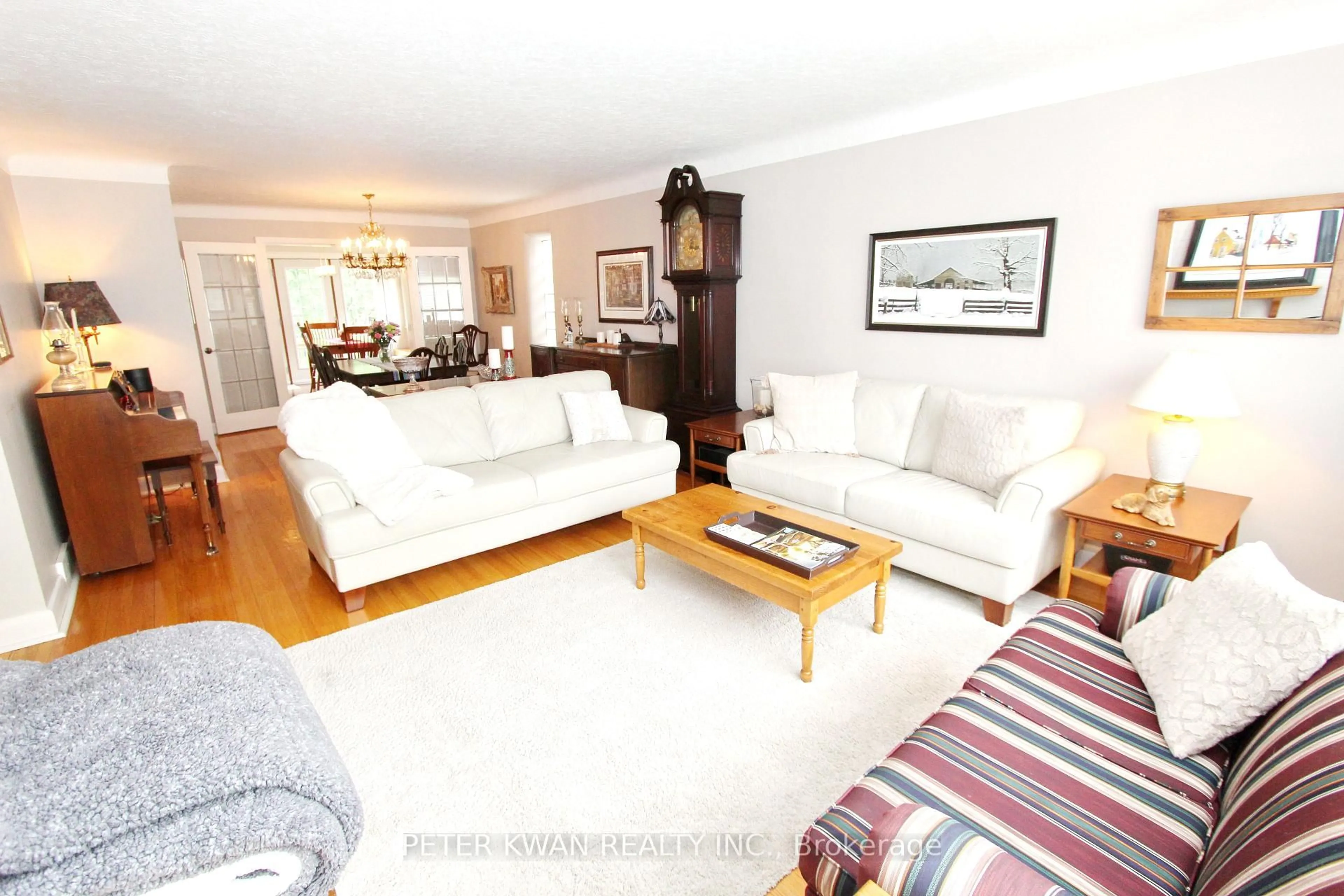 Living room with furniture, wood/laminate floor for 42 Roseview Ave, Richmond Hill Ontario L4C 1C7