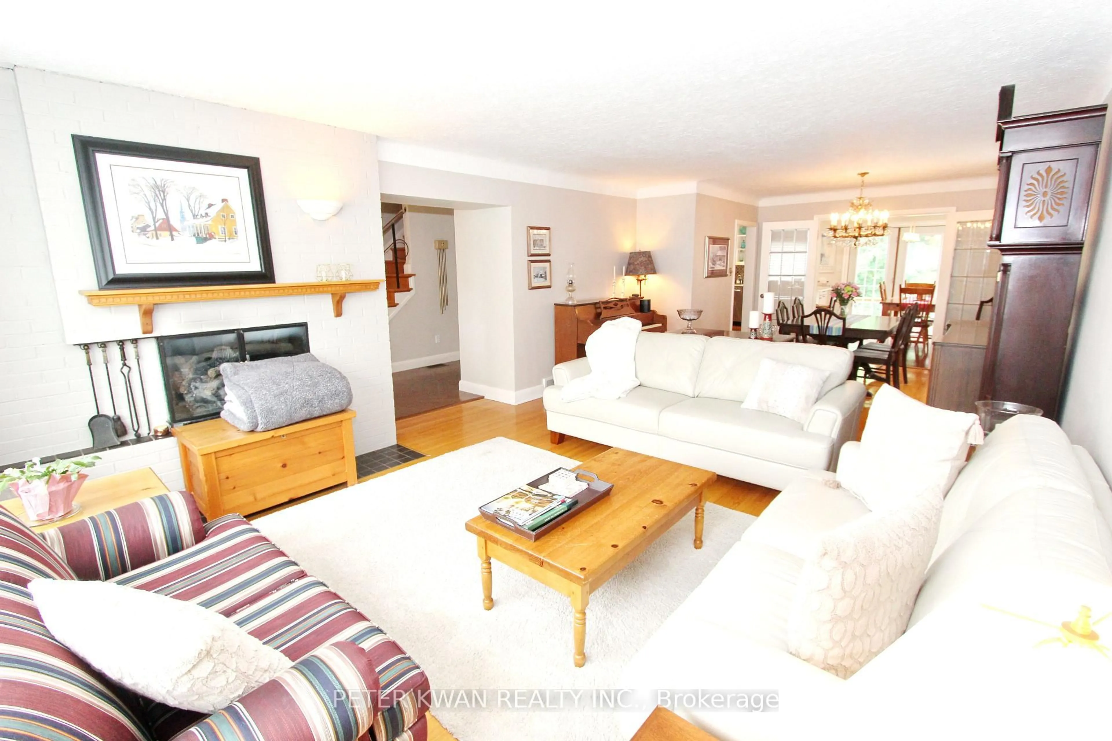 Living room with furniture, wood/laminate floor for 42 Roseview Ave, Richmond Hill Ontario L4C 1C7