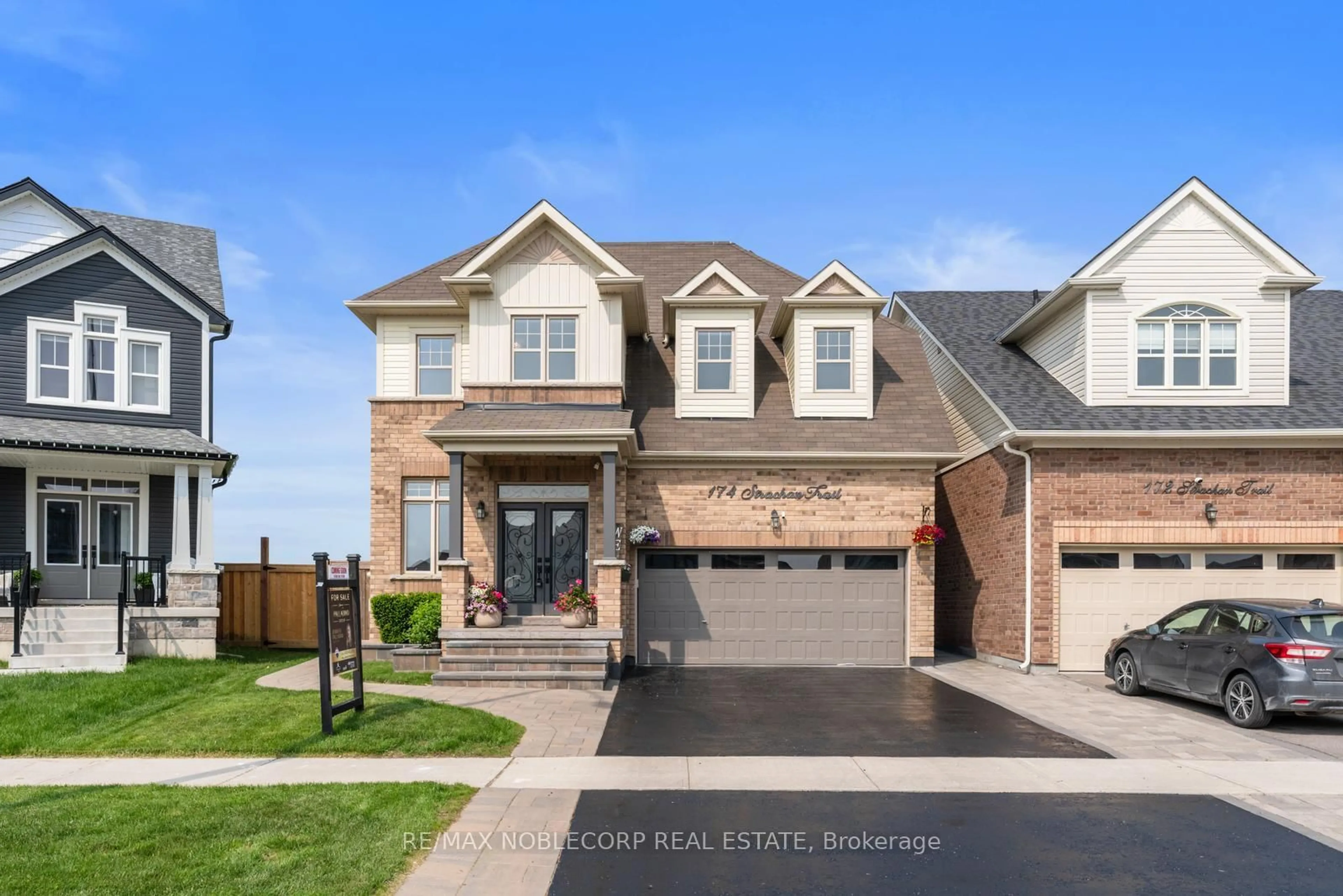 Home with brick exterior material, street for 174 Strachan Tr, New Tecumseth Ontario L0G 1A0