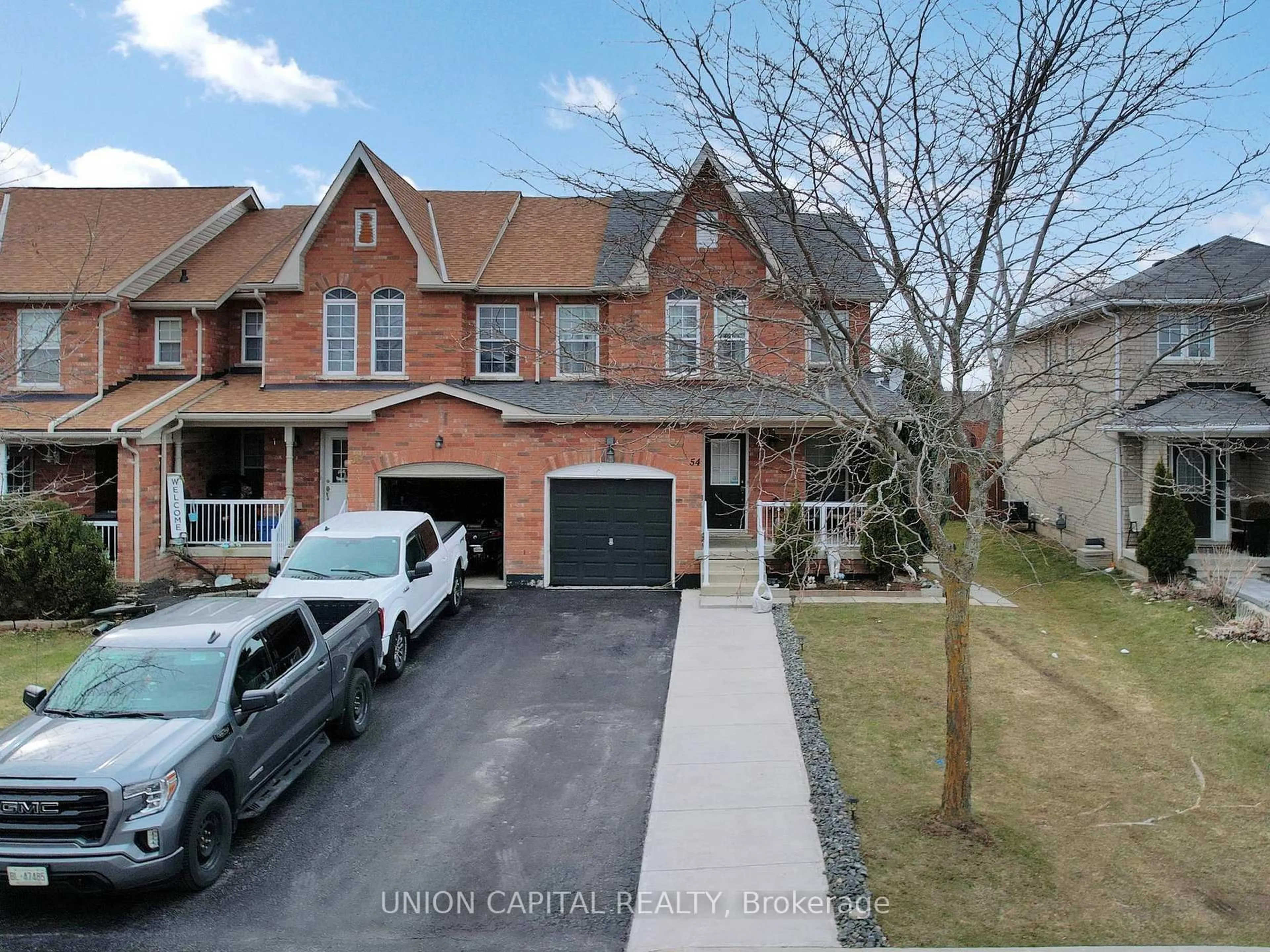 A pic from outside/outdoor area/front of a property/back of a property/a pic from drone, street for 54 Buchanan Dr, New Tecumseth Ontario L9R 0A2