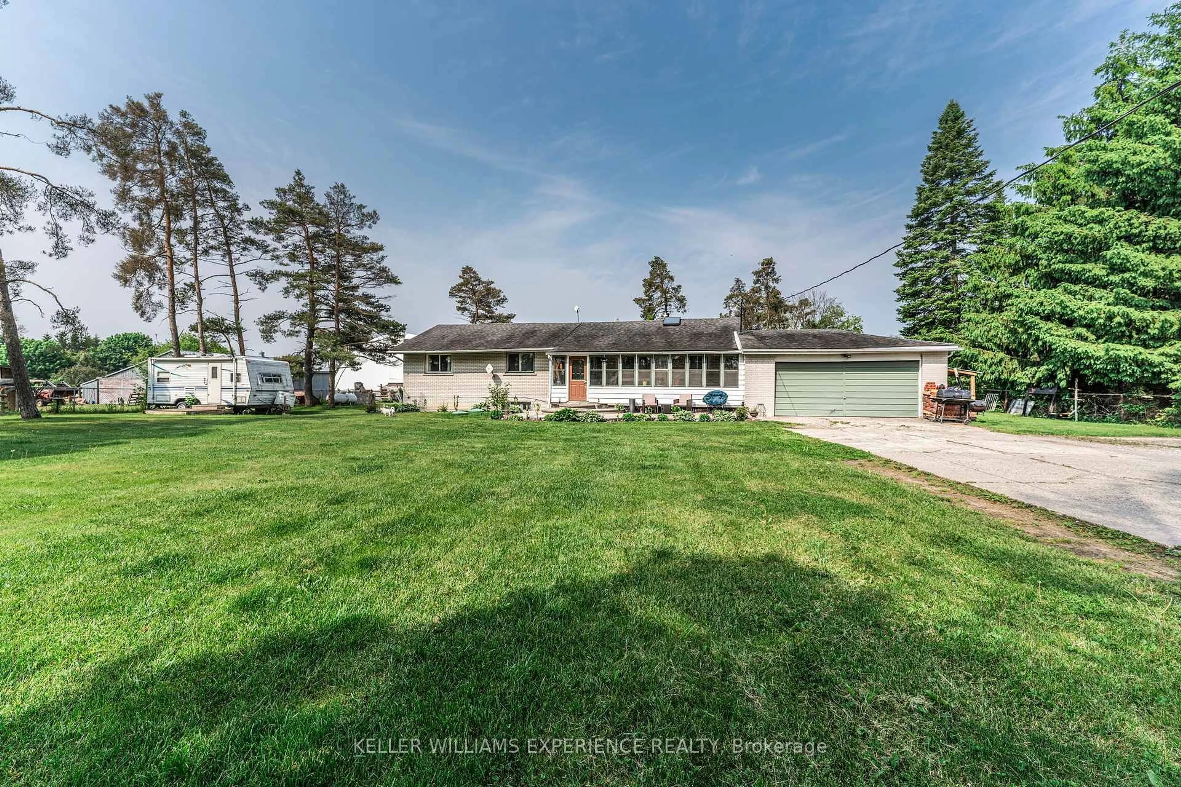 A pic from outside/outdoor area/front of a property/back of a property/a pic from drone, unknown for 7106 County Road 56, Essa Ontario L0M 1T0