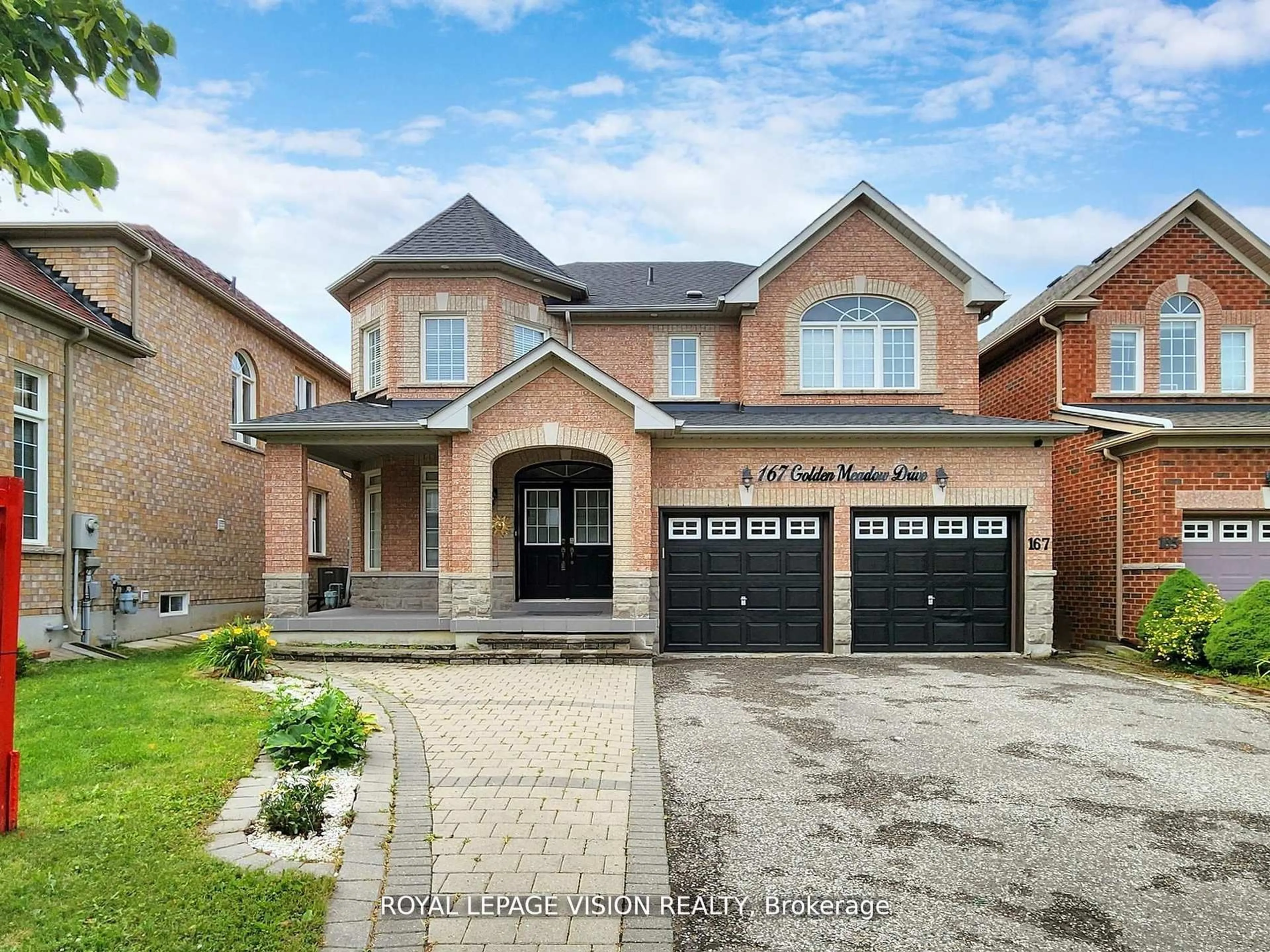 Home with brick exterior material, street for 167 Golden Meadow Dr, Markham Ontario L6E 1E2