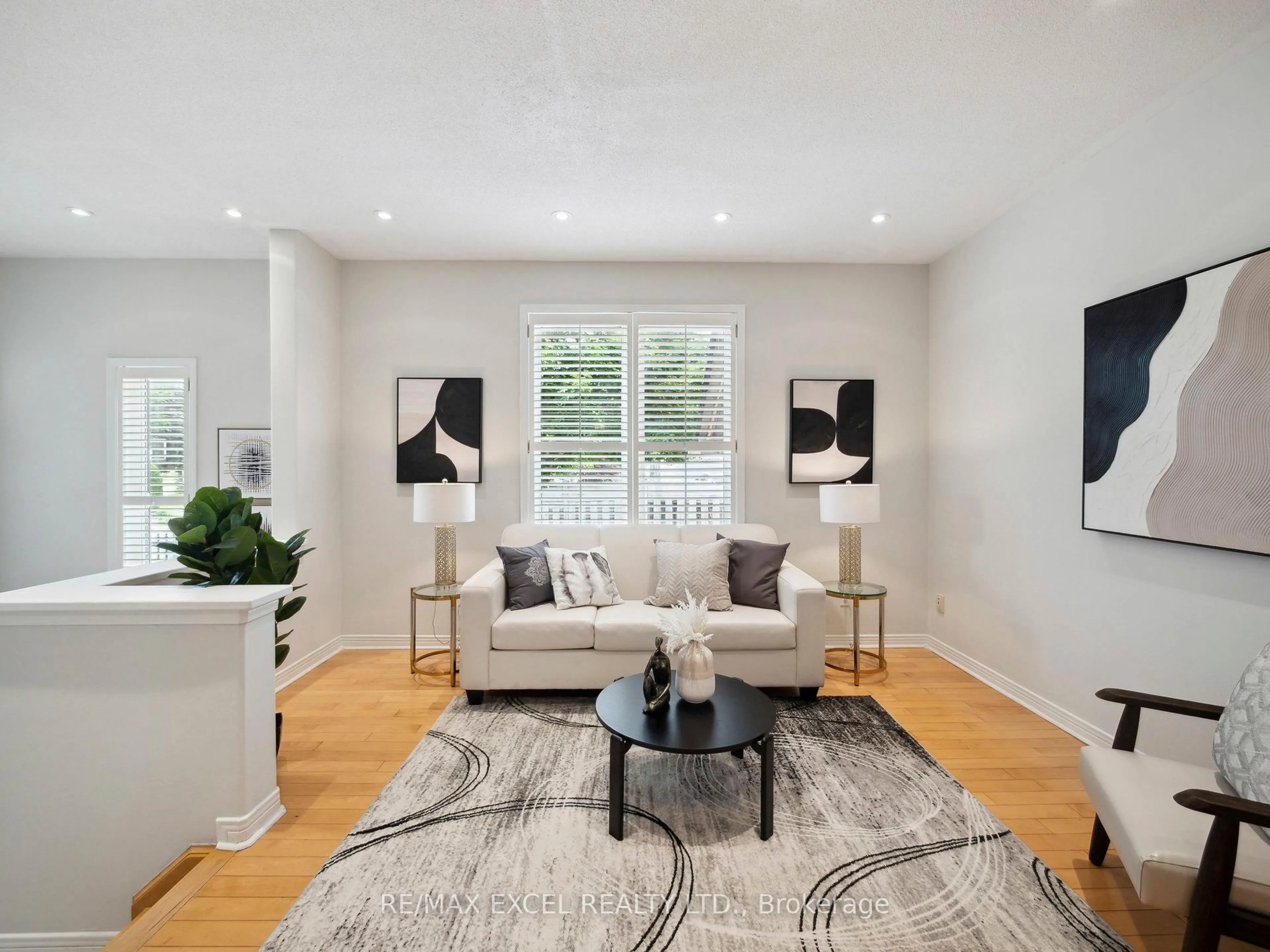 Living room with furniture, wood/laminate floor for 126 Worthing Ave, Markham Ontario L3S 4K1