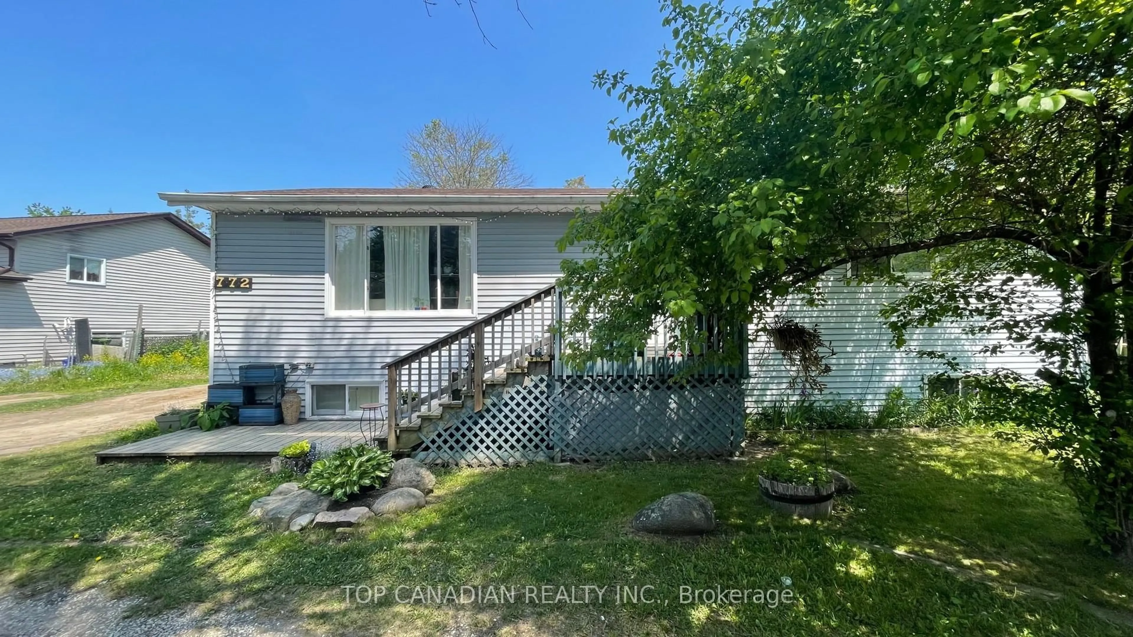 A pic from outside/outdoor area/front of a property/back of a property/a pic from drone, water/lake/river/ocean view for 772 Happy Vale Dr, Innisfil Ontario L9S 2E5
