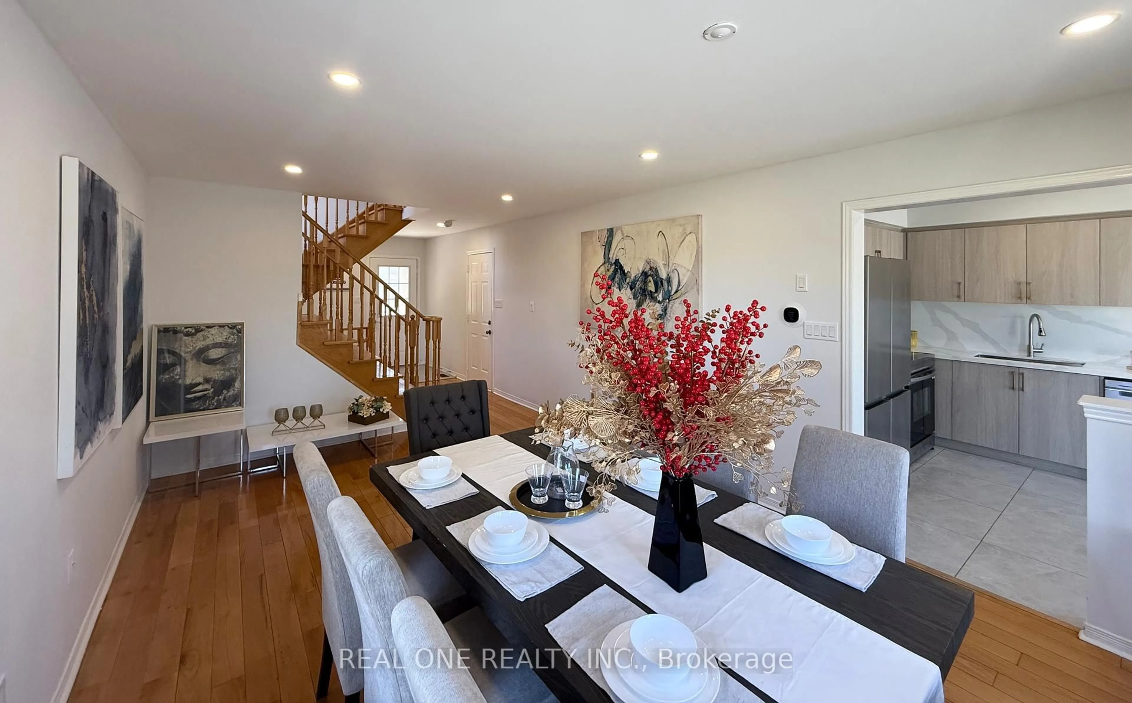 Dining room, wood/laminate floor for 10 Prince Charles Way, Markham Ontario L6C 0B5