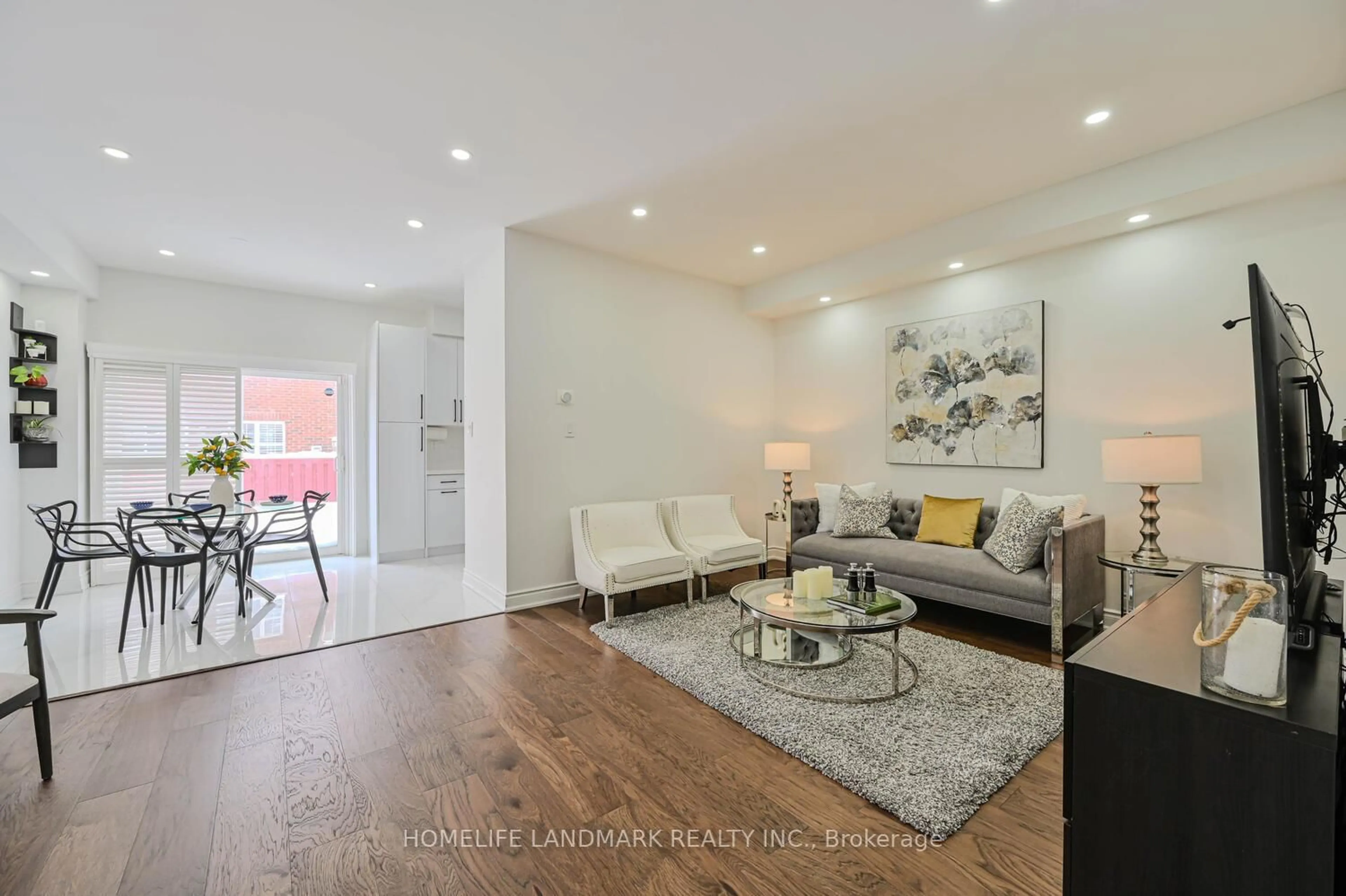 Living room with furniture, wood/laminate floor for 97 Arco Circ, Vaughan Ontario L6A 3Z6