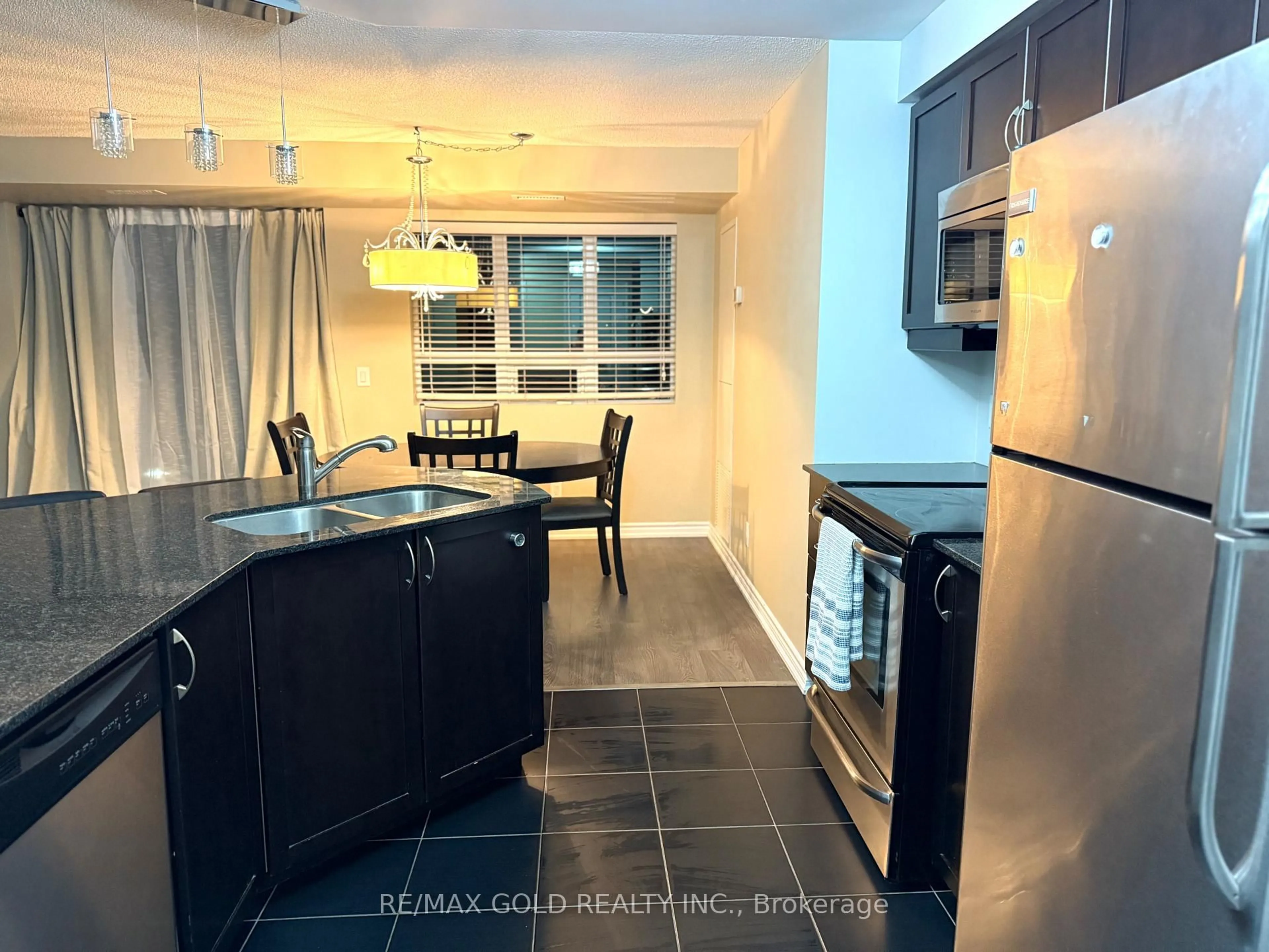 Open concept kitchen, ceramic/tile floor for 7730 Kipling Ave #311, Vaughan Ontario L4L 1Y9