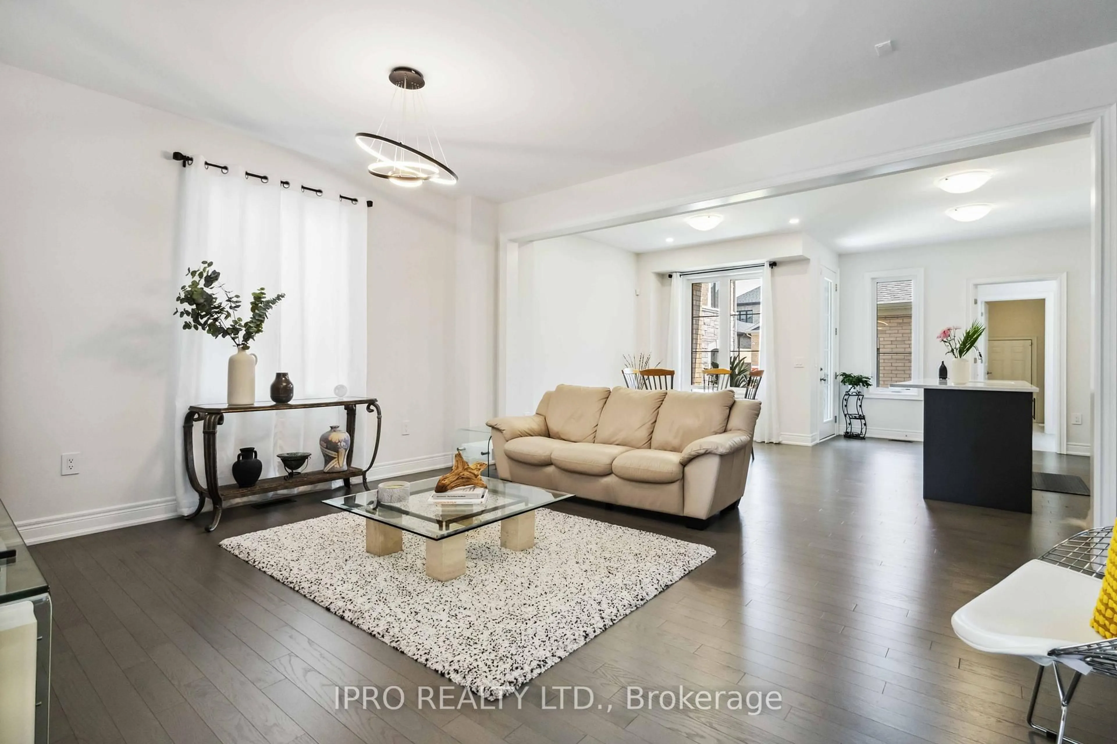 Living room with furniture, wood/laminate floor for 12 Fred Lablanc Dr, Markham Ontario L6B 1R8