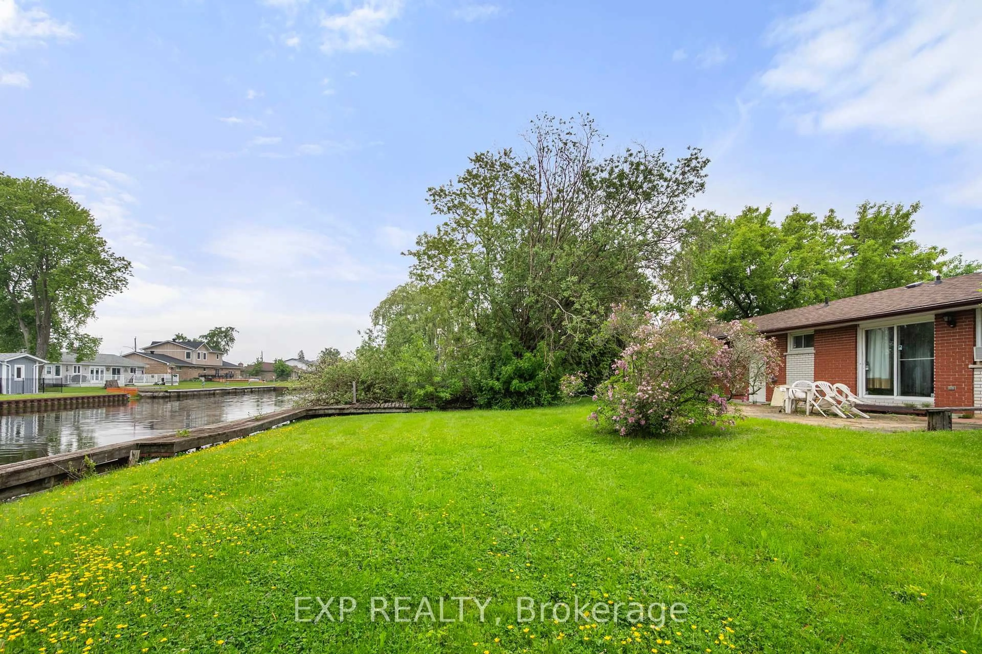 A pic from outside/outdoor area/front of a property/back of a property/a pic from drone, water/lake/river/ocean view for 38 Canal St, Georgina Ontario L4P 1K5