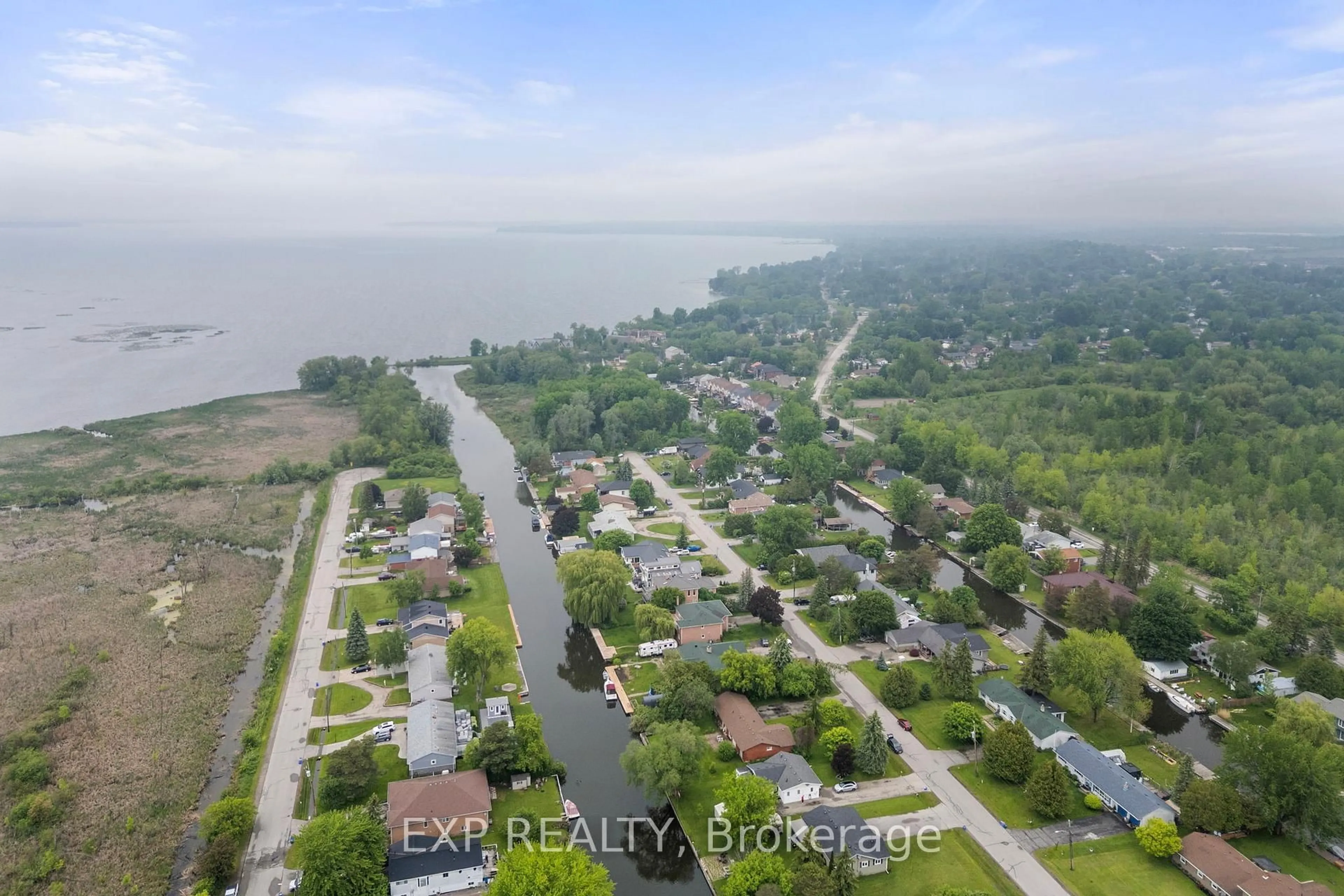 A pic from outside/outdoor area/front of a property/back of a property/a pic from drone, water/lake/river/ocean view for 38 Canal St, Georgina Ontario L4P 1K5