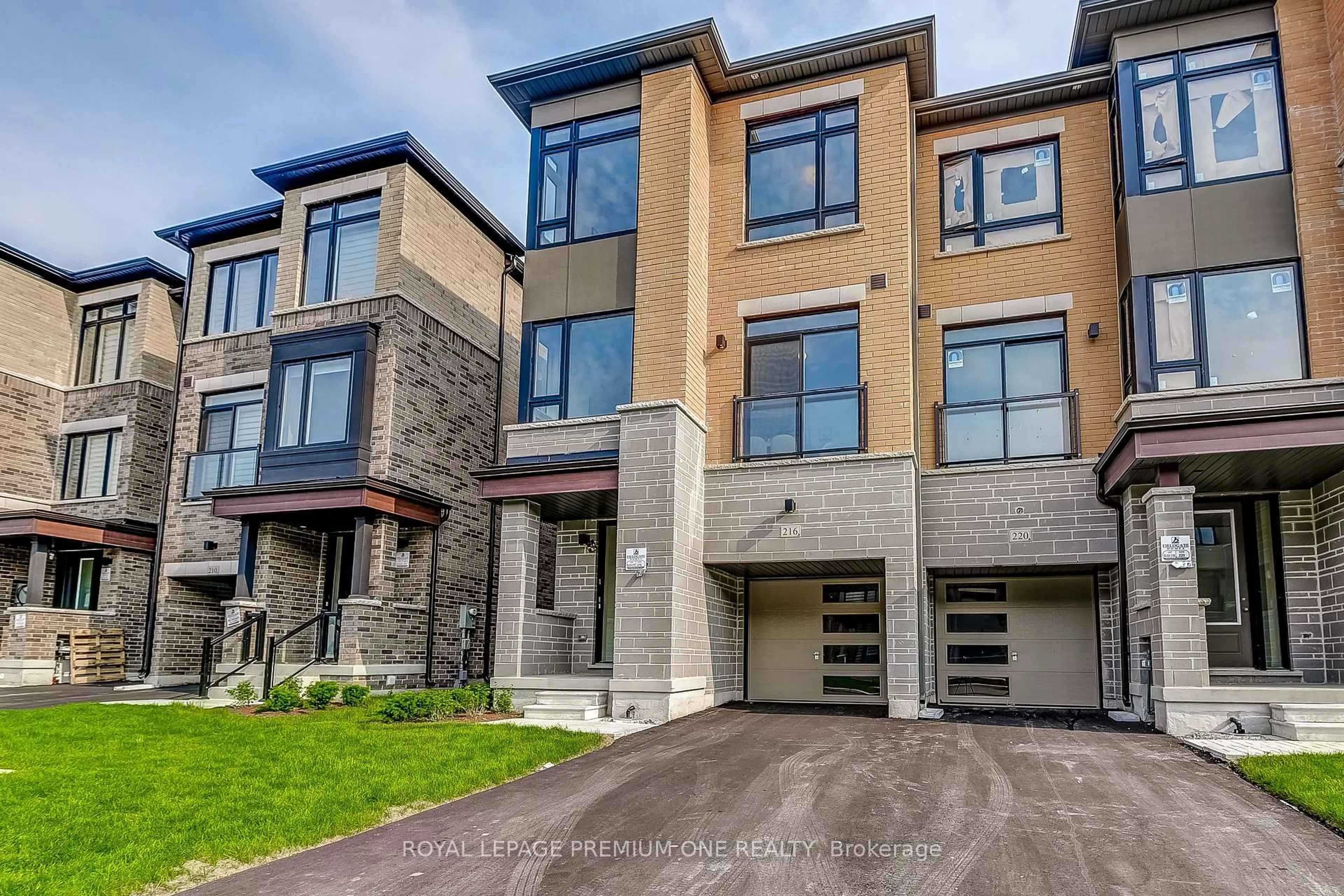 Home with brick exterior material, street for 216 Tennant Circ, Vaughan Ontario L4H 5L4