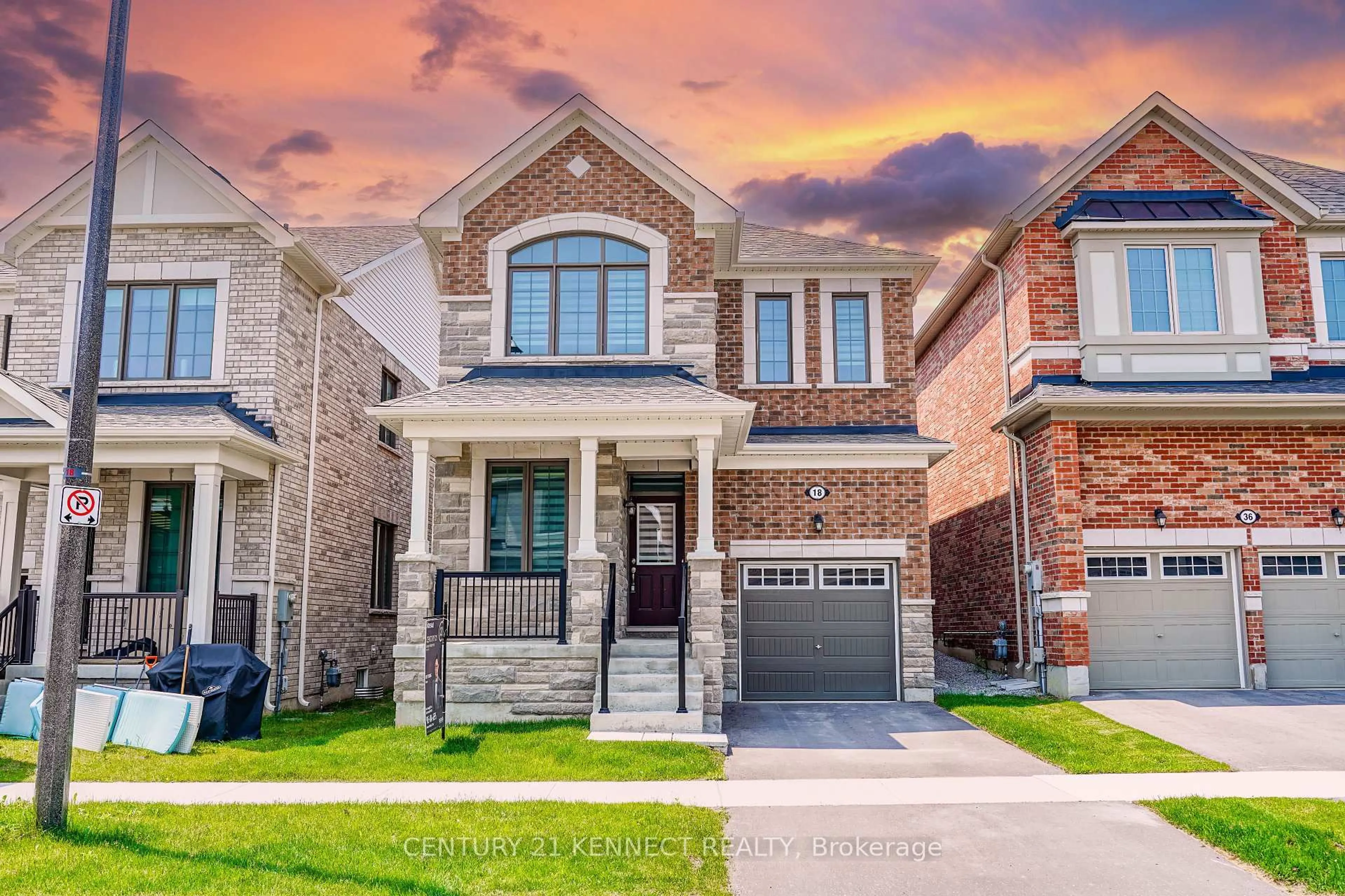 Home with brick exterior material, street for 18 Cecil Sinclair Dr, Markham Ontario L6C 3L3