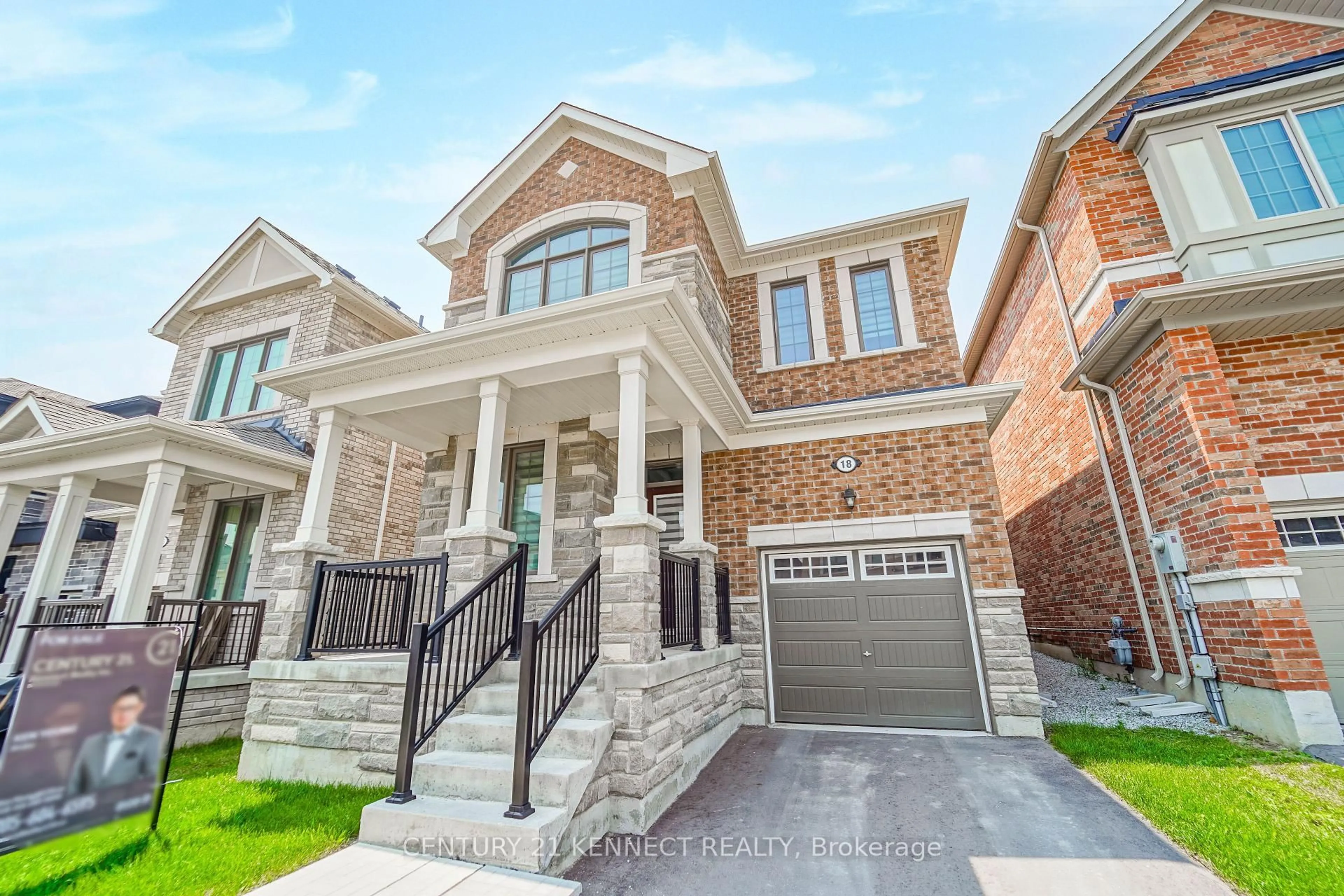 Home with brick exterior material, street for 18 Cecil Sinclair Dr, Markham Ontario L6C 3L3