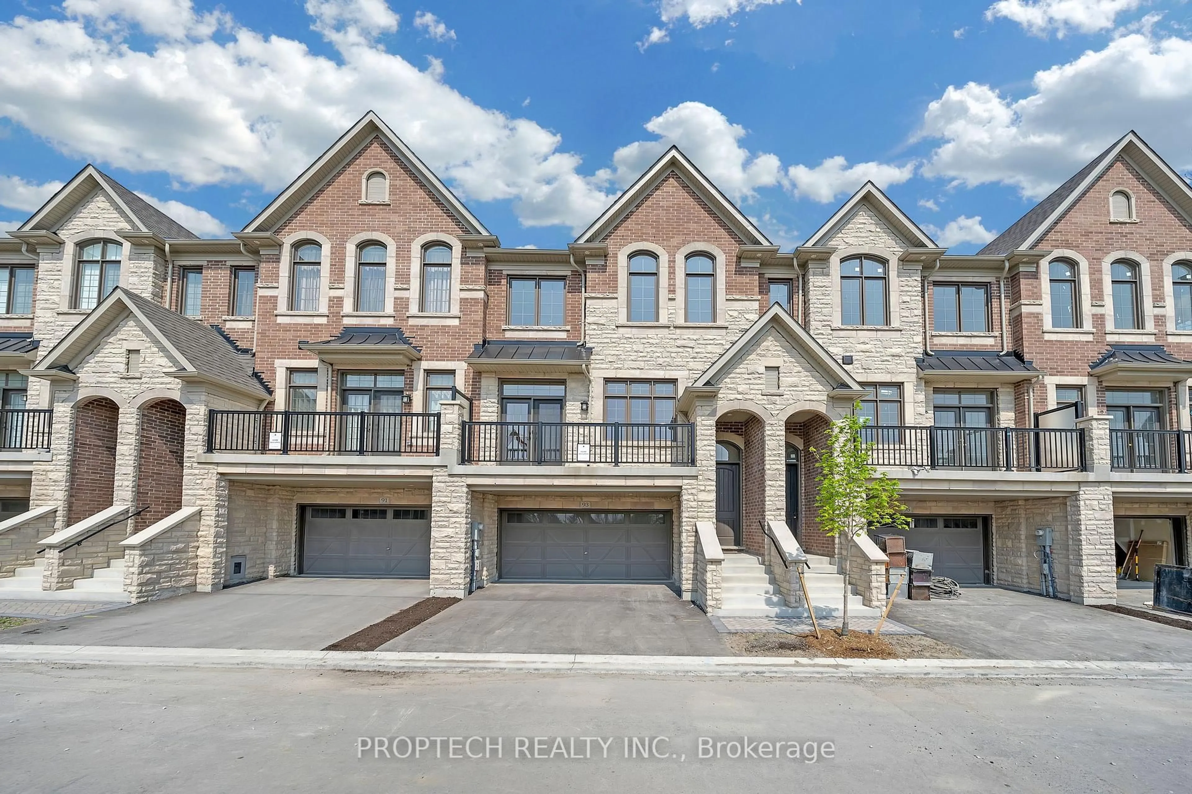 Home with brick exterior material, street for 93 West Village Lane, Markham Ontario L6C 3L5