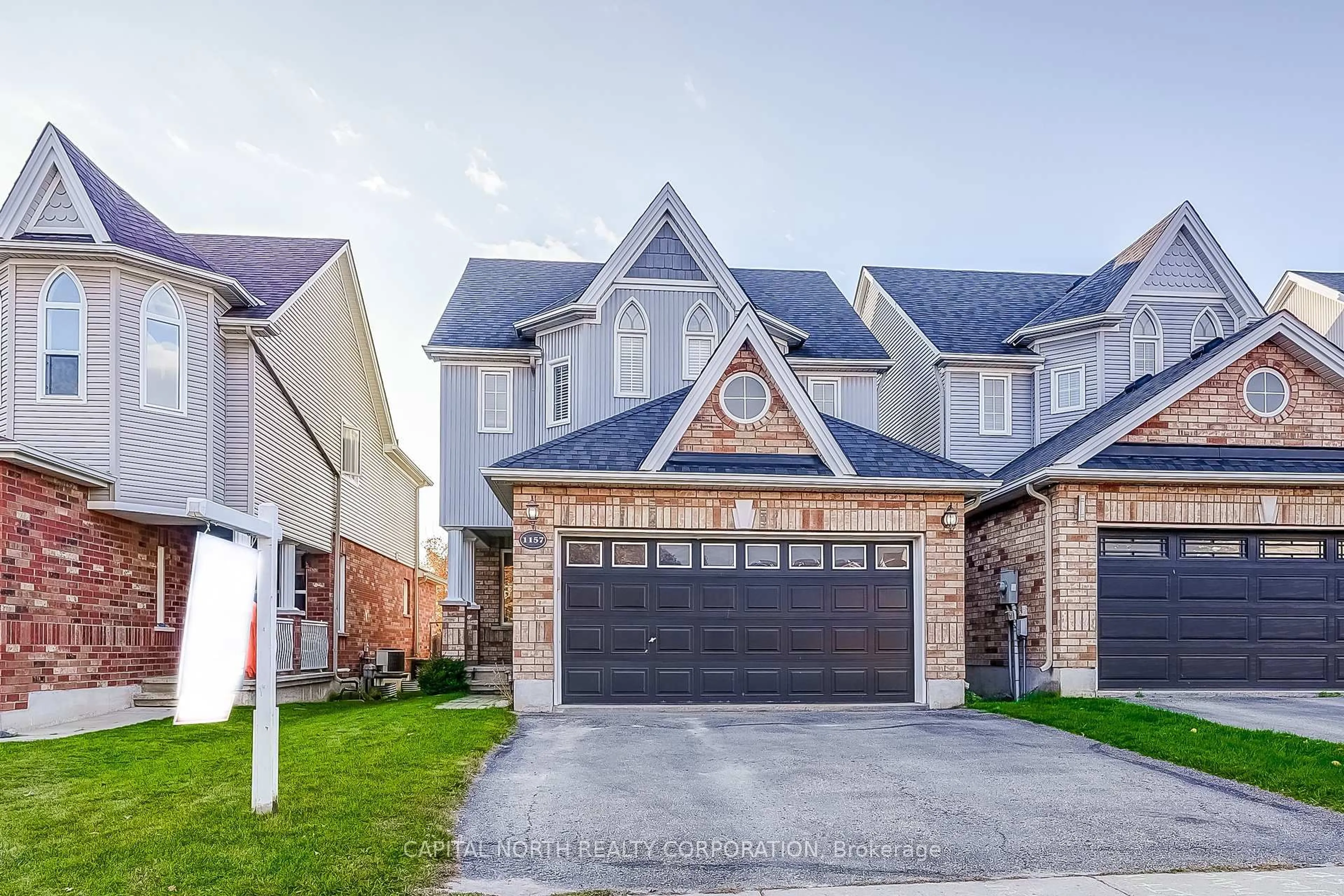 Home with brick exterior material, street for 1157 Kell St, Innisfil Ontario L9S 4W3