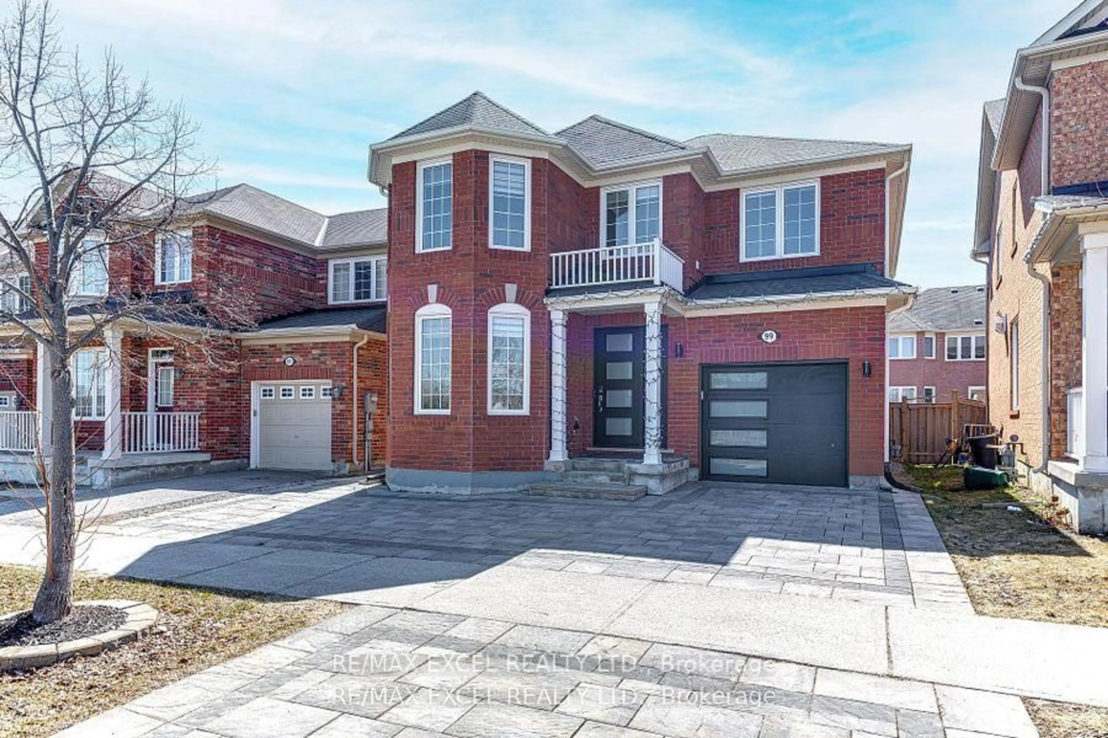 Home with brick exterior material, street for 99 James Parrott Ave, Markham Ontario L6E 2B3