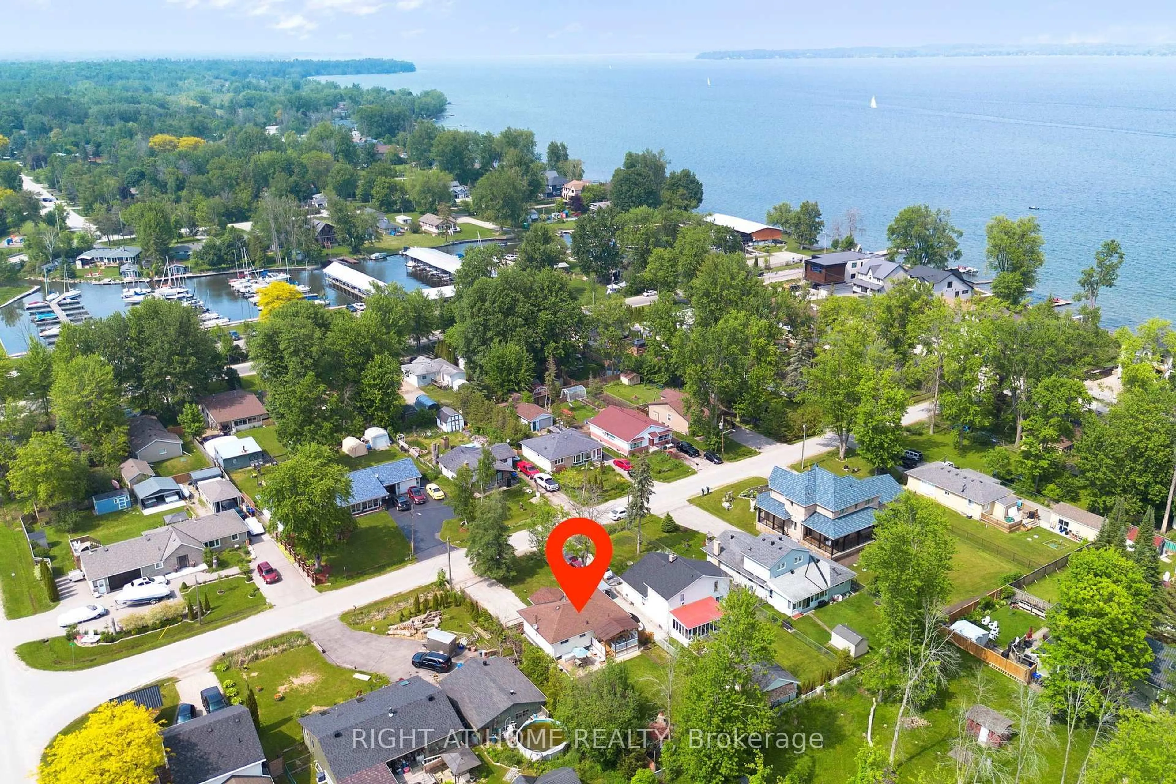 A pic from outside/outdoor area/front of a property/back of a property/a pic from drone, water/lake/river/ocean view for 1129 Lindy Lane, Innisfil Ontario L0L 1R0