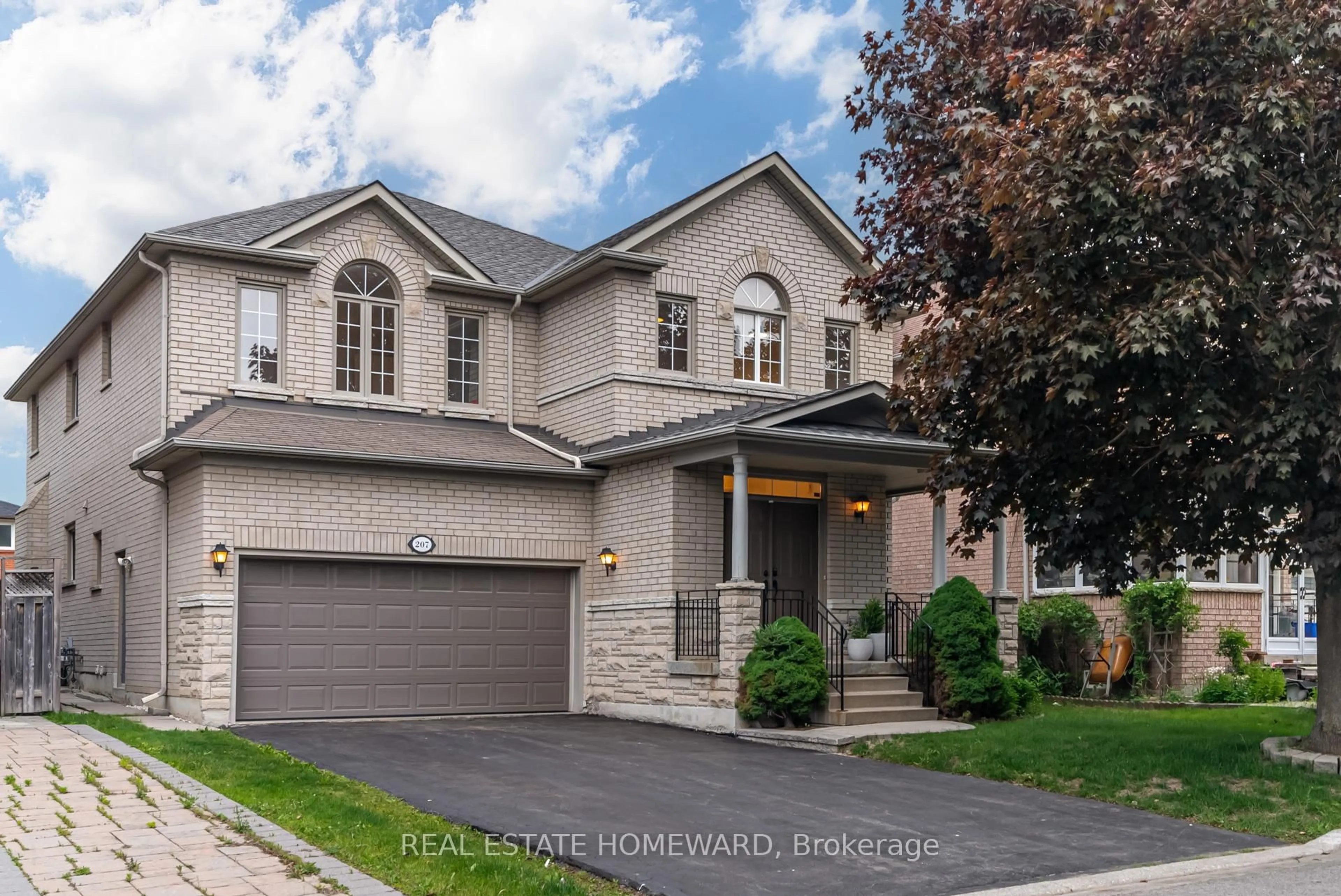 Home with brick exterior material, street for 207 Valentina Dr, Markham Ontario L3R 4R5