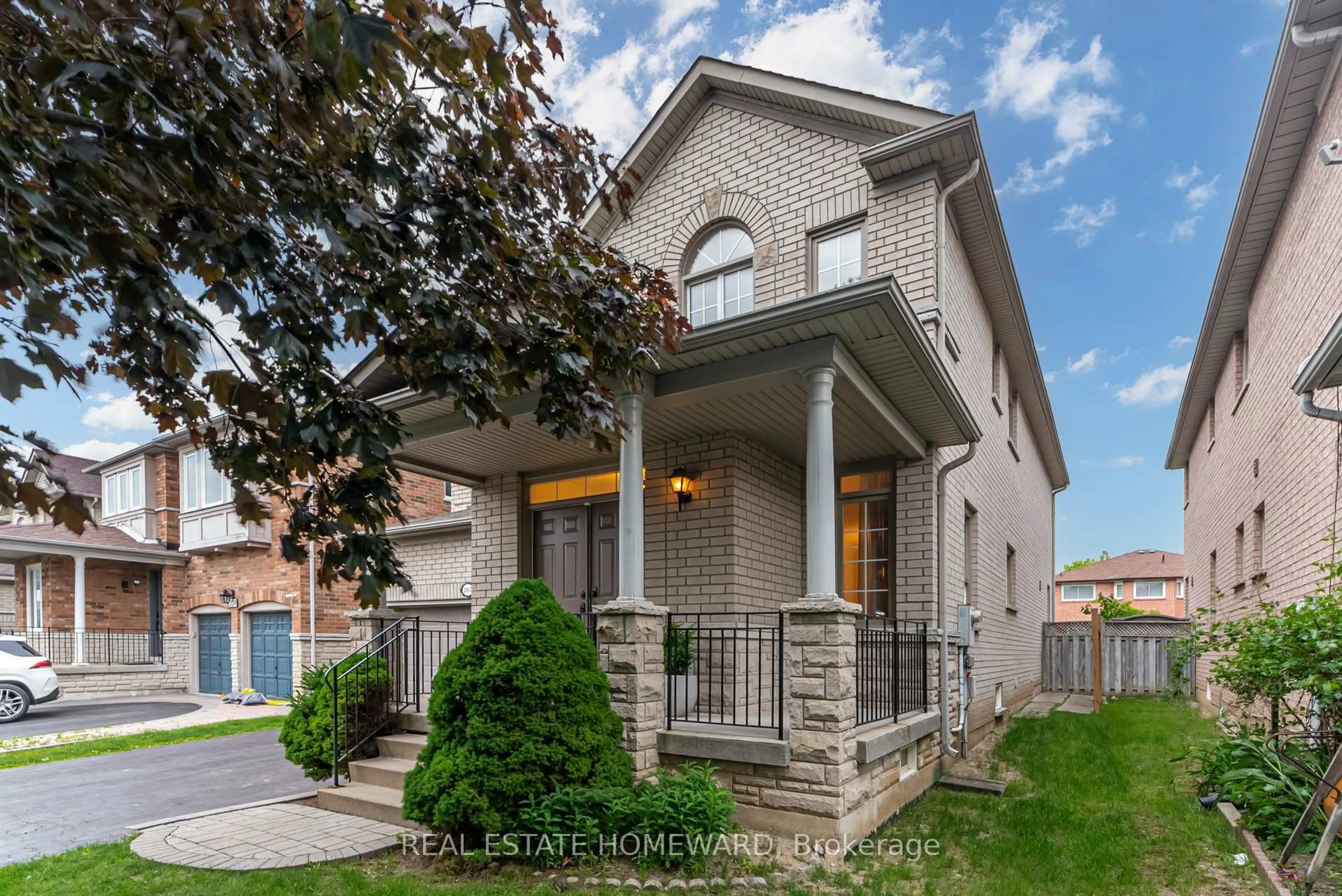 Home with brick exterior material, street for 207 Valentina Dr, Markham Ontario L3R 4R5