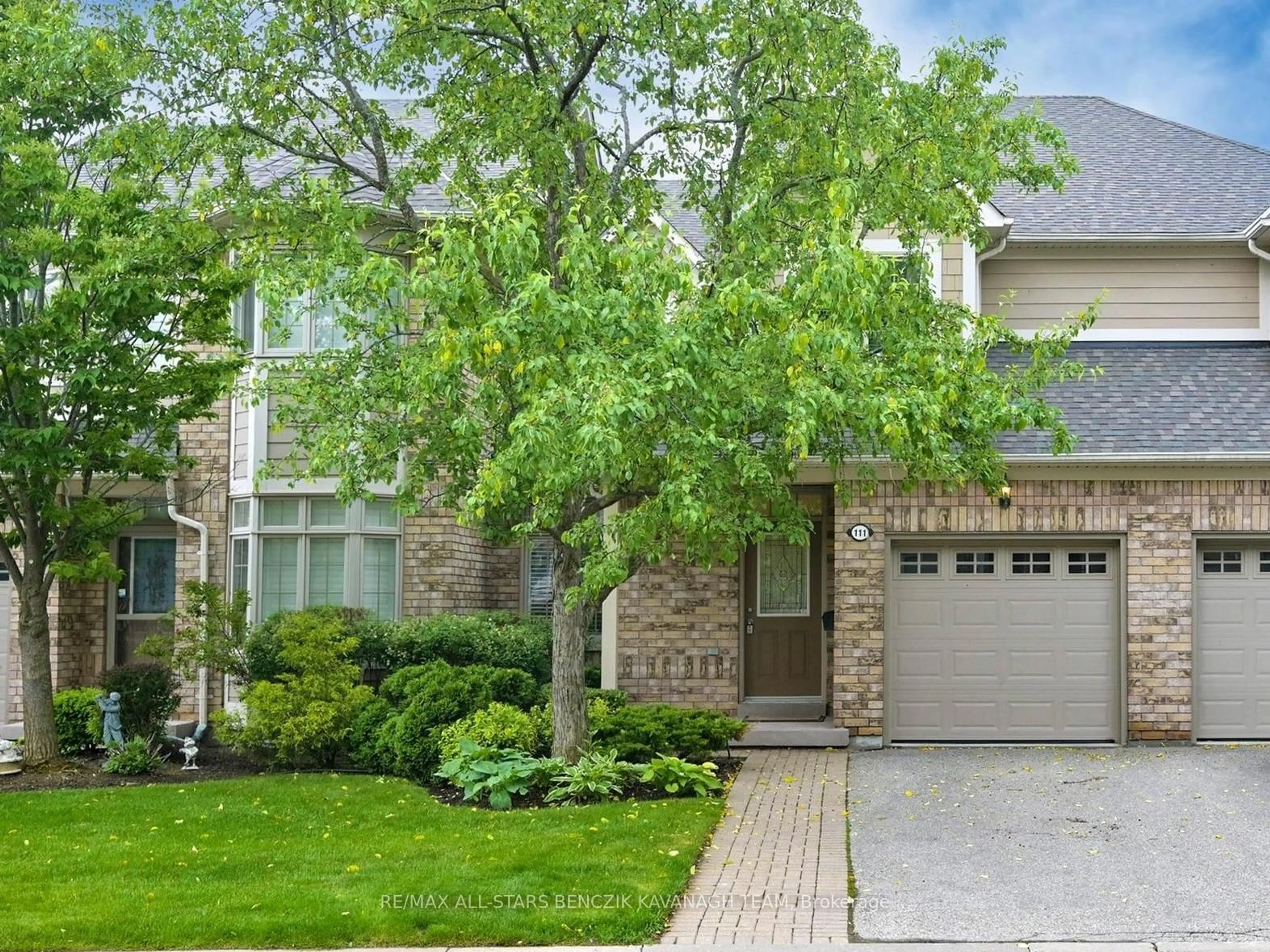 Home with brick exterior material, street for 111 Louisbourg Way, Markham Ontario L6E 2A2