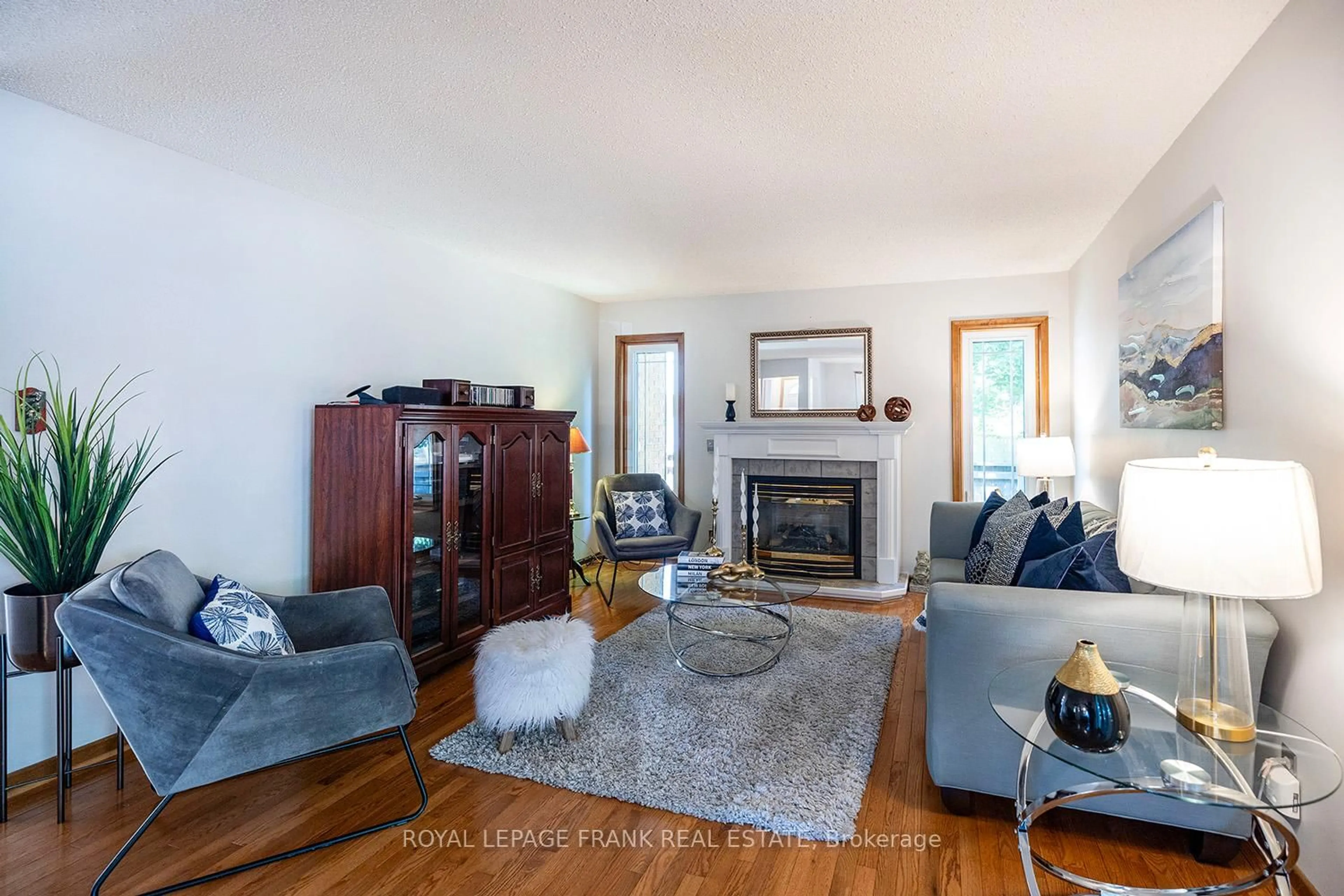 Living room with furniture, wood/laminate floor for 13 Country Lane, Brock Ontario L0E 1E0