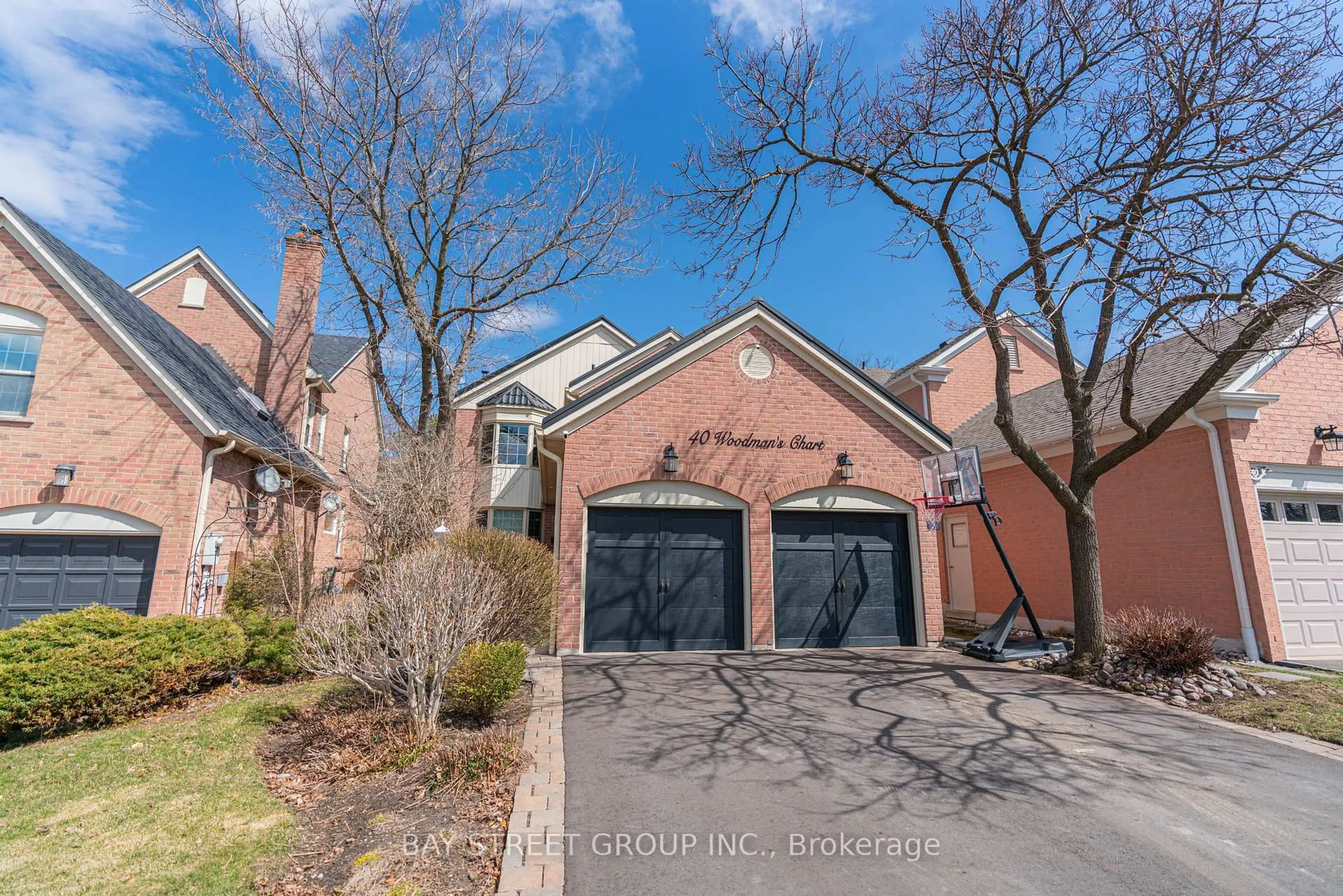 Home with brick exterior material, street for 40 Woodmans Chart, Markham Ontario L3R 6K7