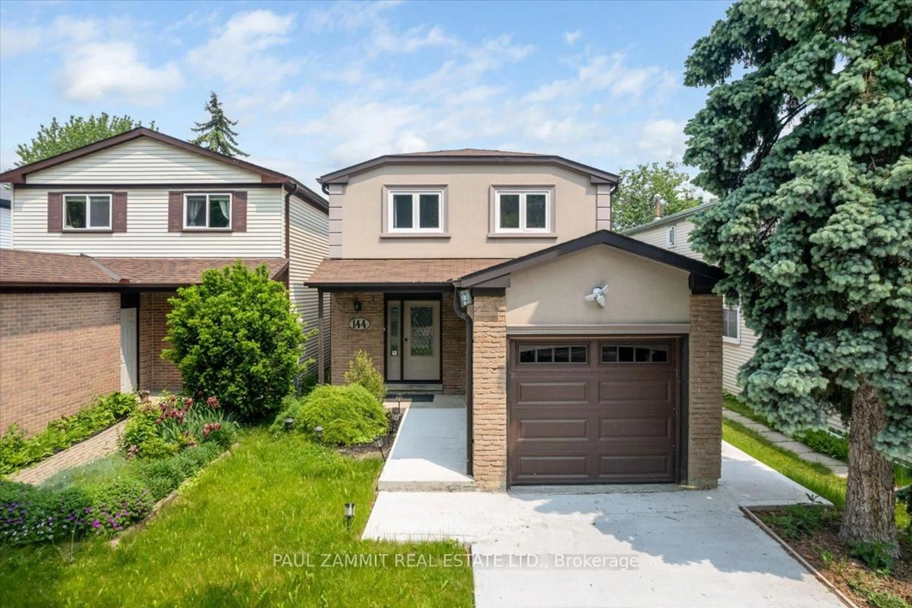Home with brick exterior material, street for 144 Snowshoe Cres, Markham Ontario L3T 4M9