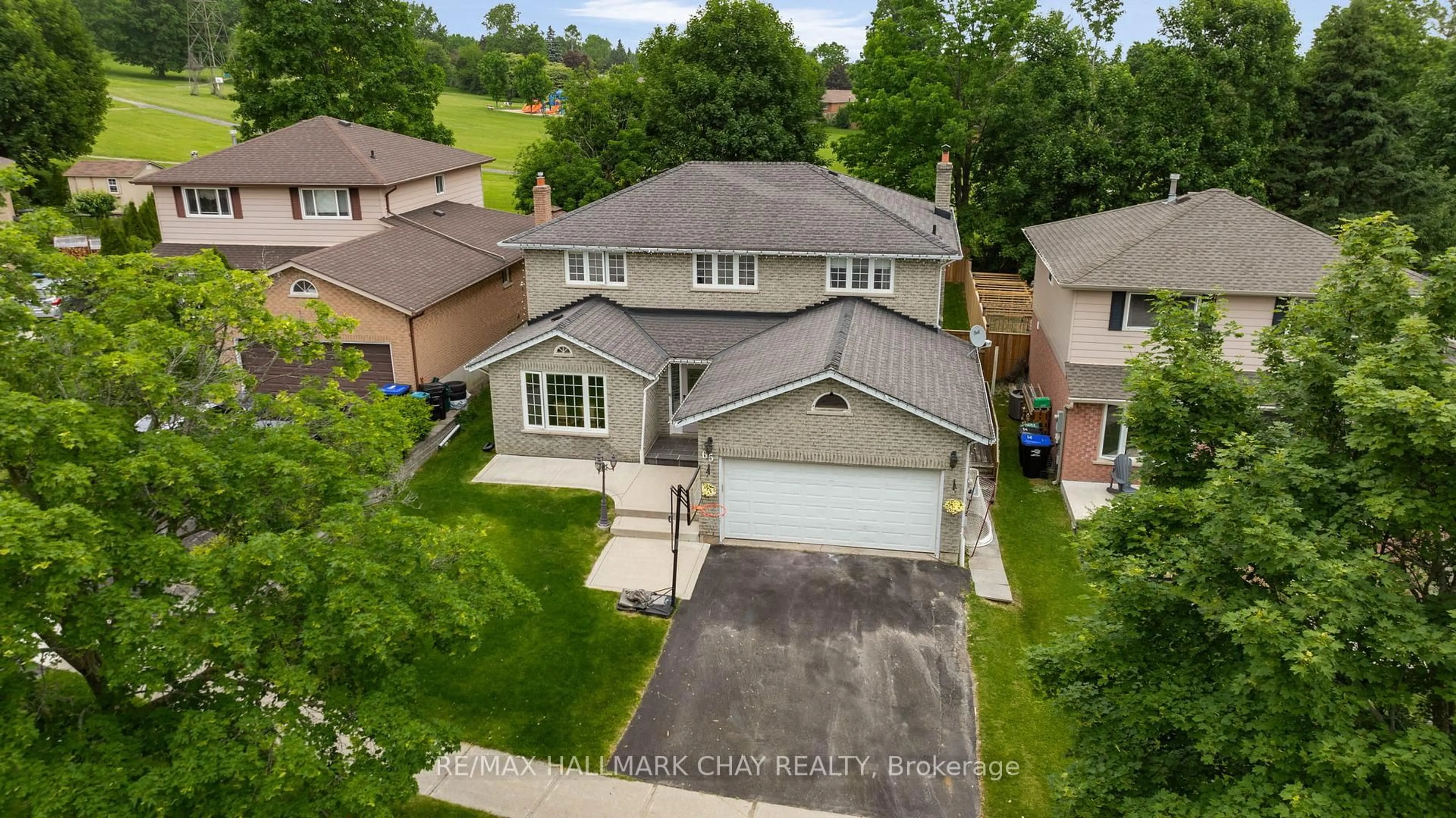 A pic from outside/outdoor area/front of a property/back of a property/a pic from drone, street for 65 Imperial Cres, Bradford West Gwillimbury Ontario L3Z 2N8