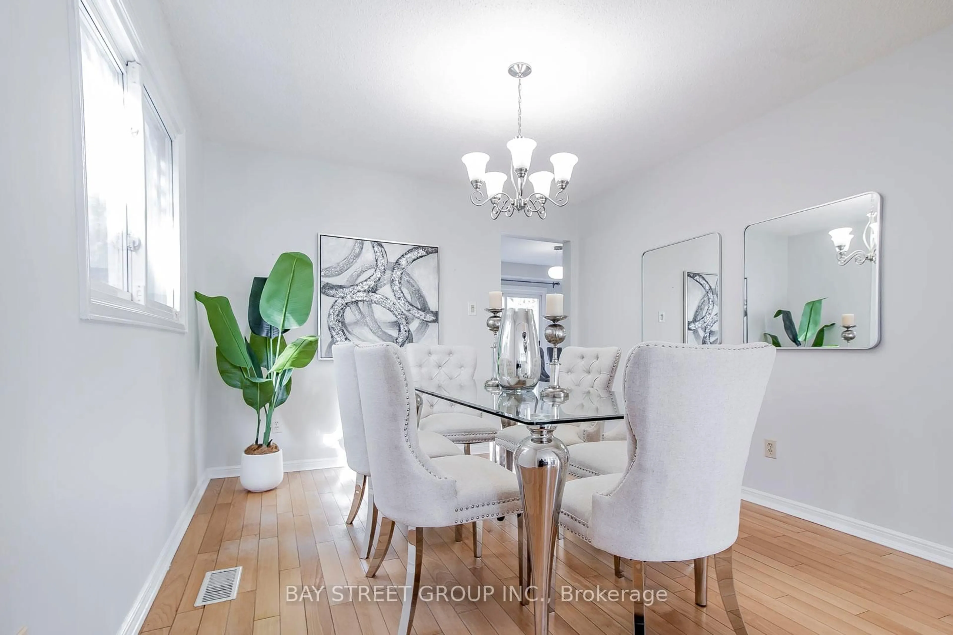 Dining room, wood/laminate floor for 300 Fincham Ave, Markham Ontario L3P 4E7