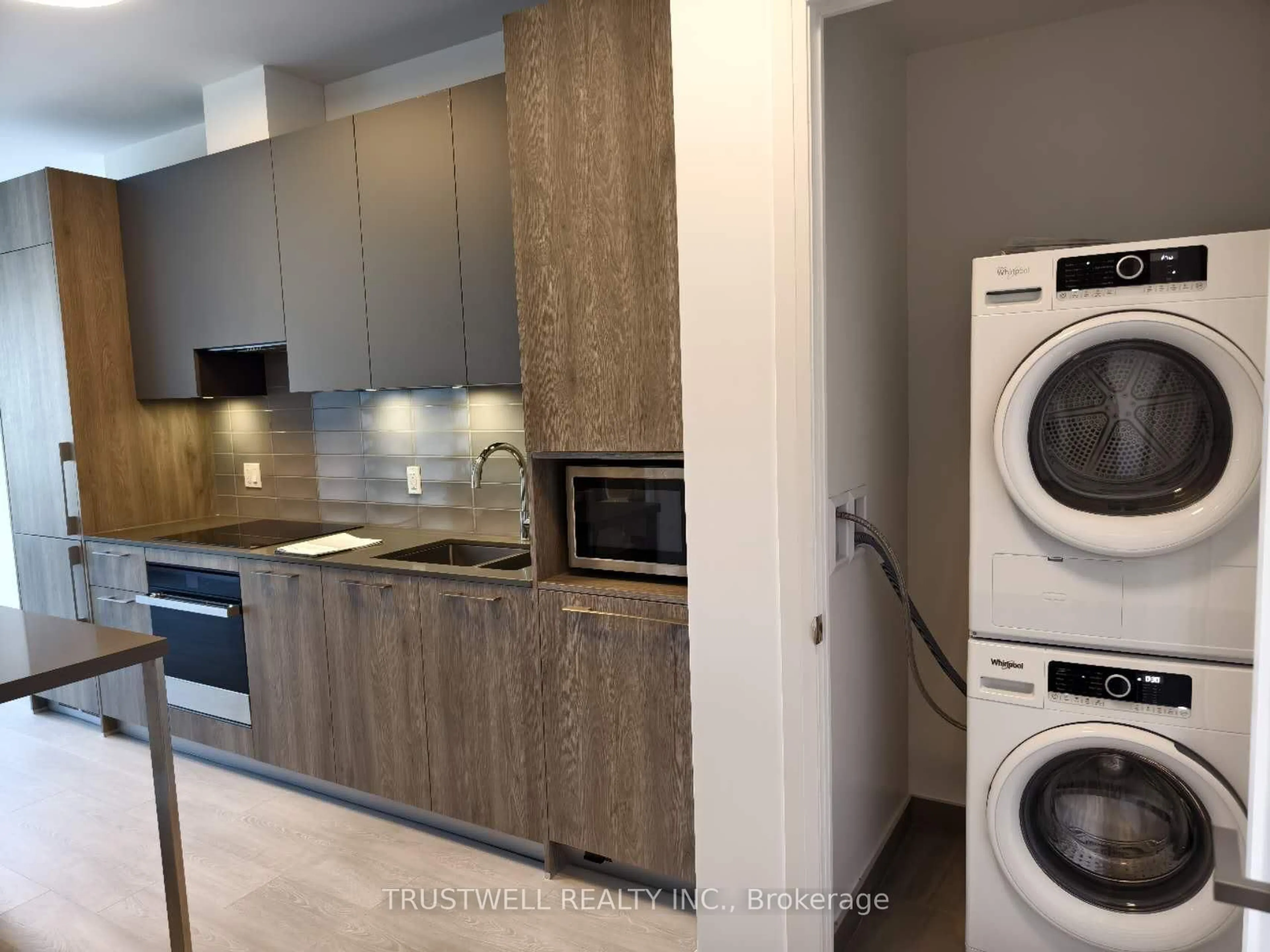 Kitchen with laundary machines, unknown for 38 Water Walk Dr #315, Markham Ontario L3R 6M8