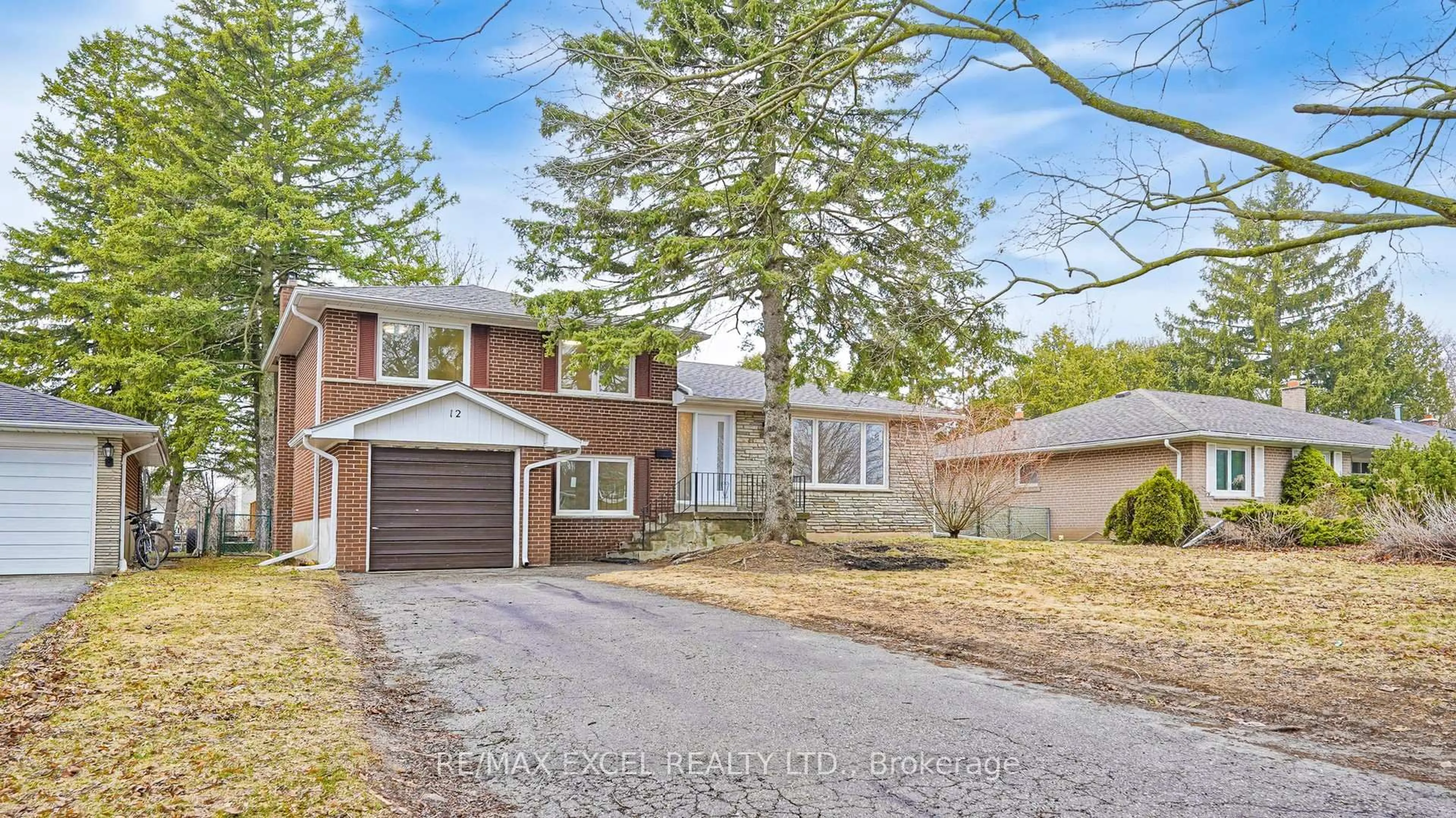 Home with brick exterior material, street for 12 Lakevista Ave, Markham Ontario L3P 1H5