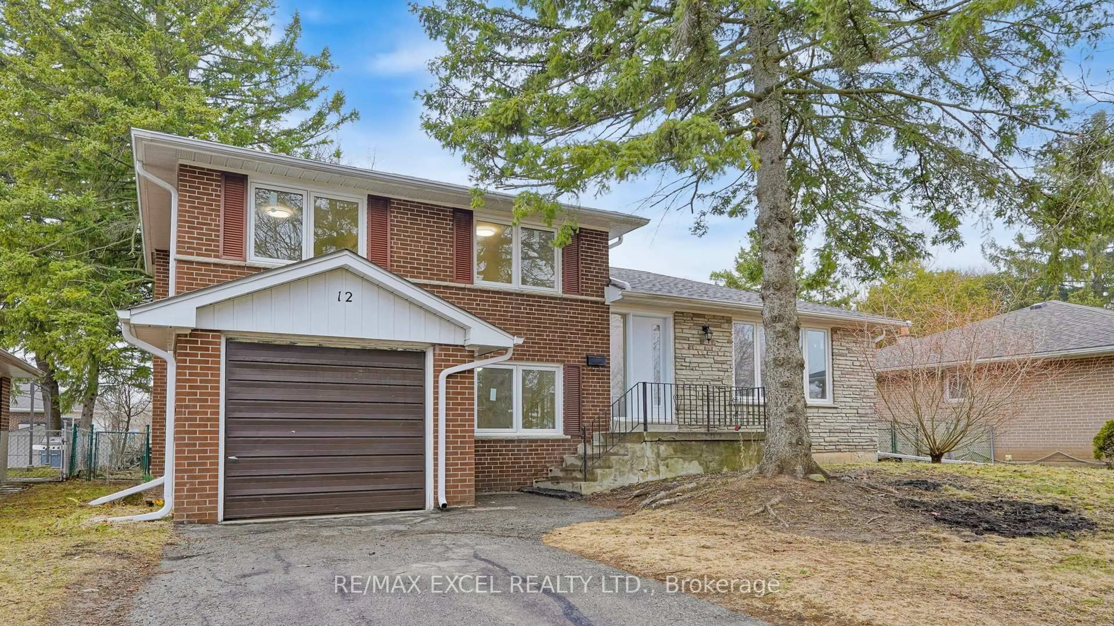 Home with brick exterior material, street for 12 Lakevista Ave, Markham Ontario L3P 1H5