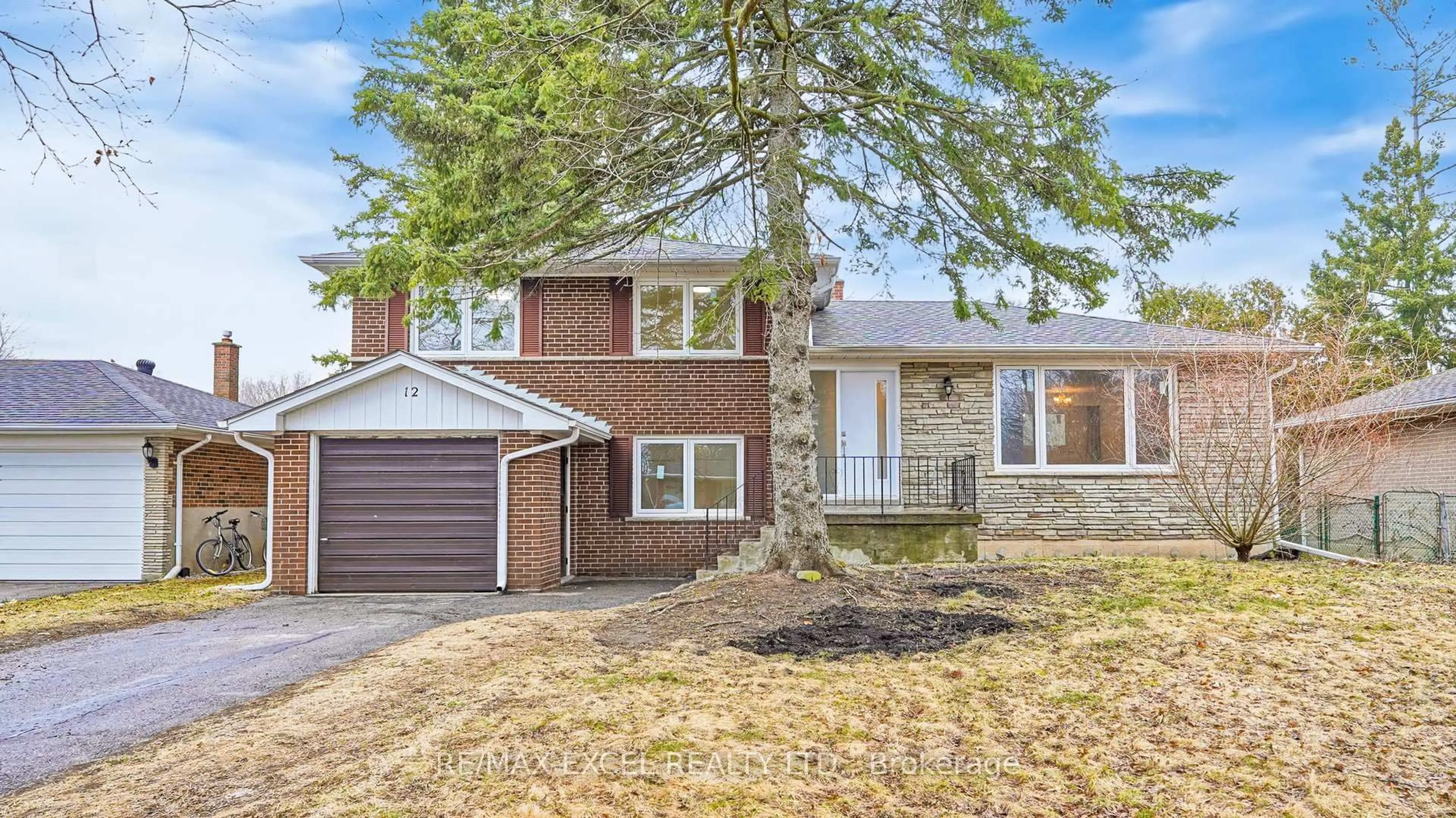 Home with brick exterior material, street for 12 Lakevista Ave, Markham Ontario L3P 1H5