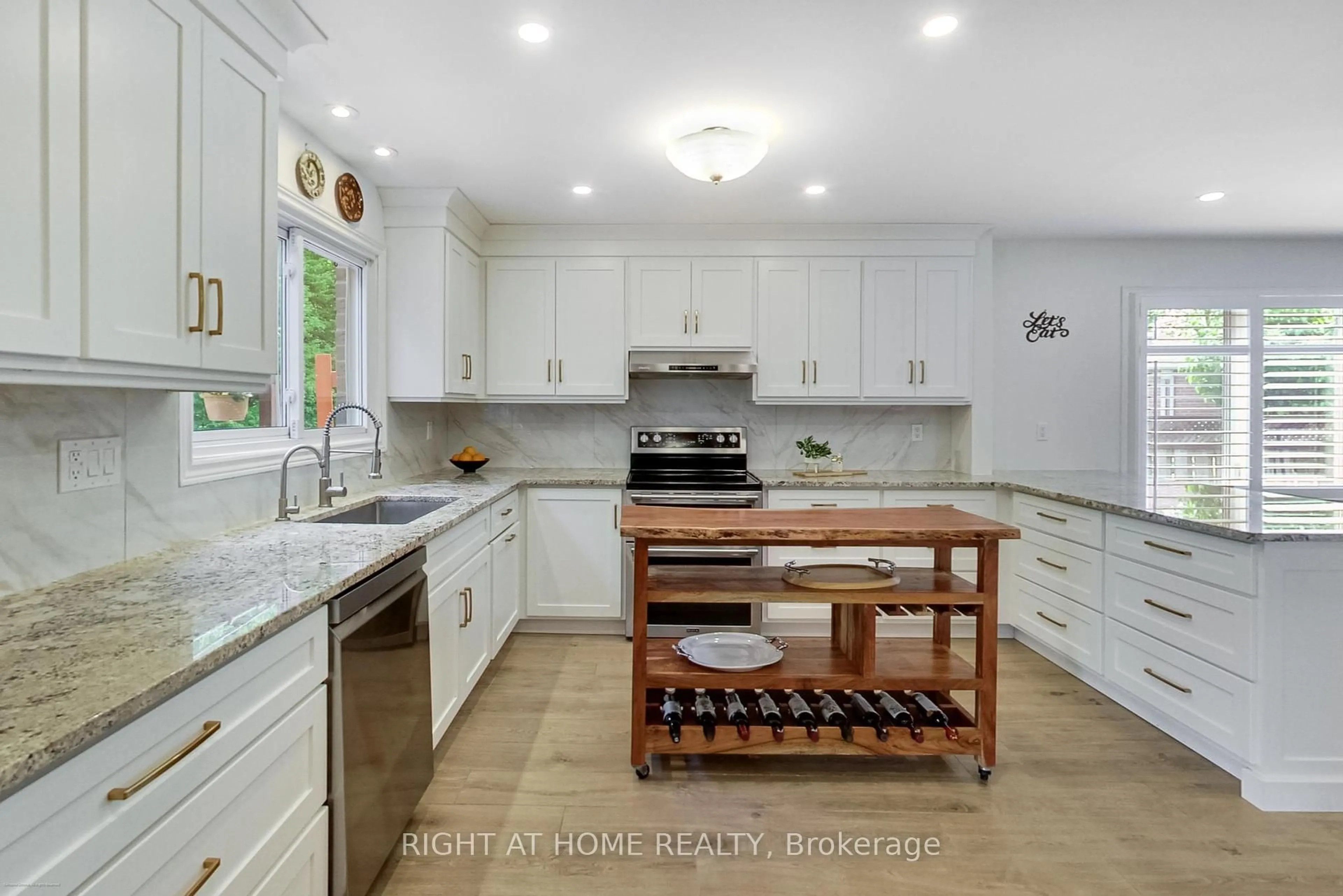 Open concept kitchen, ceramic/tile floor for 393 Vanden Bergh Blvd, Newmarket Ontario L3Y 7Z8